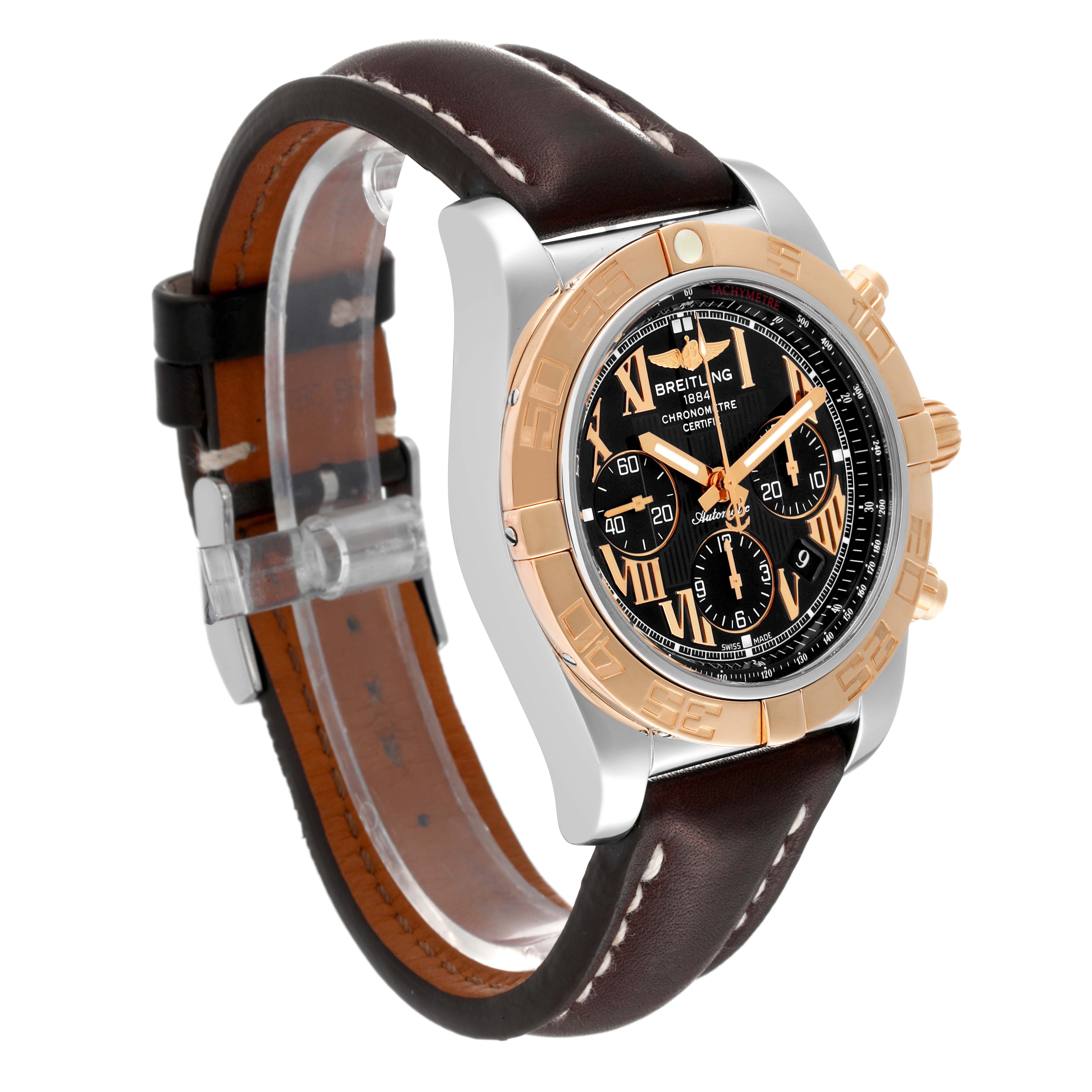 This Breitling Chronomat CB0110 Men's Steel and Gold (two tone) Black Dial CB0110 Men's Steel and Gold (two tone) Black Dial watch is shown at a three-quarter angle, featuring the face, bezel, crown, and leather strap.