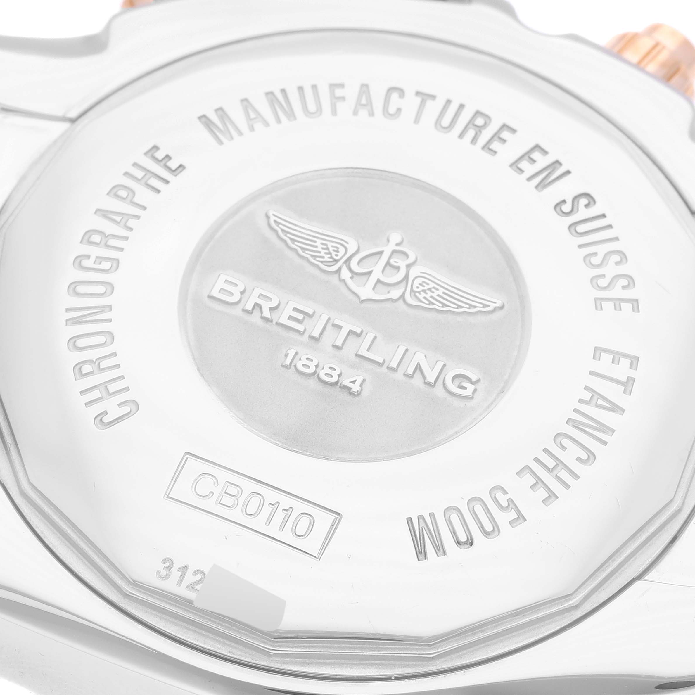 The image shows the back case of a Breitling Chronomat CB0110 Men's Steel and Gold (two tone) Black Dial CB0110 Men's Steel and Gold (two tone) Black Dial watch, featuring branding and model details.