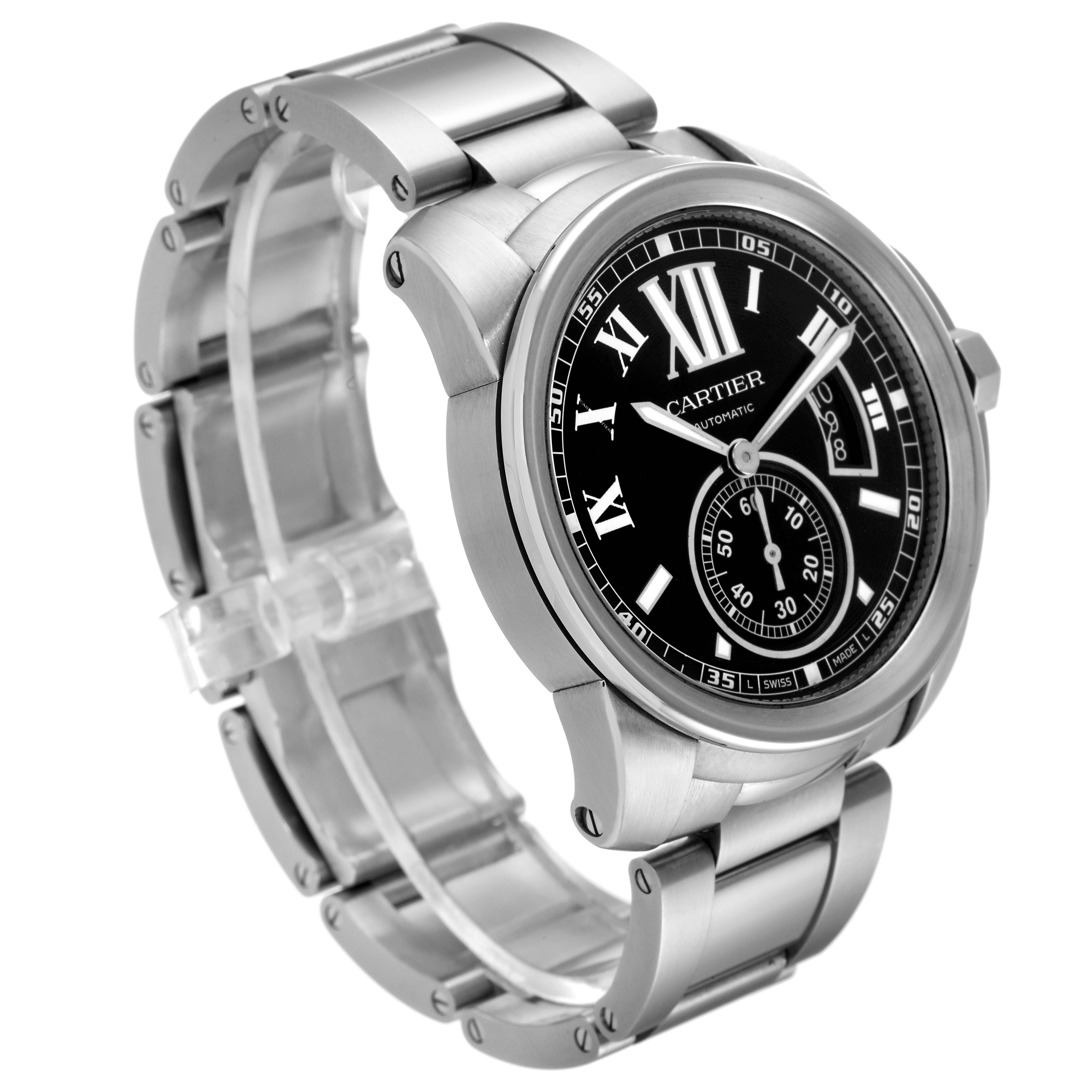 The image shows a Calibre de Cartier model by Cartier from a front angle, highlighting the watch face and metal band.