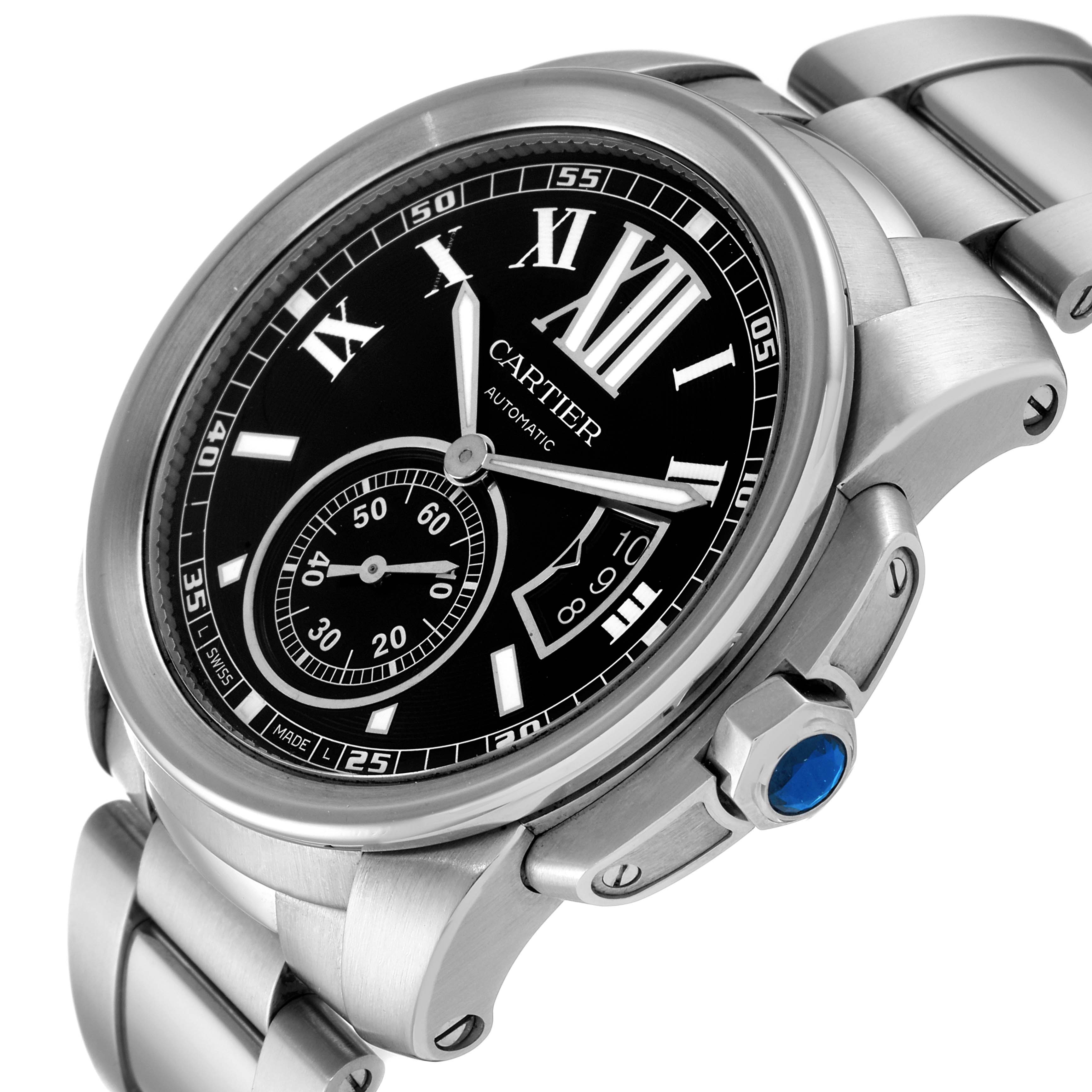 The image shows a Calibre de Cartier watch by Cartier at a tilted angle, highlighting the dial, hands, bracelet, crown, and part of the bezel.