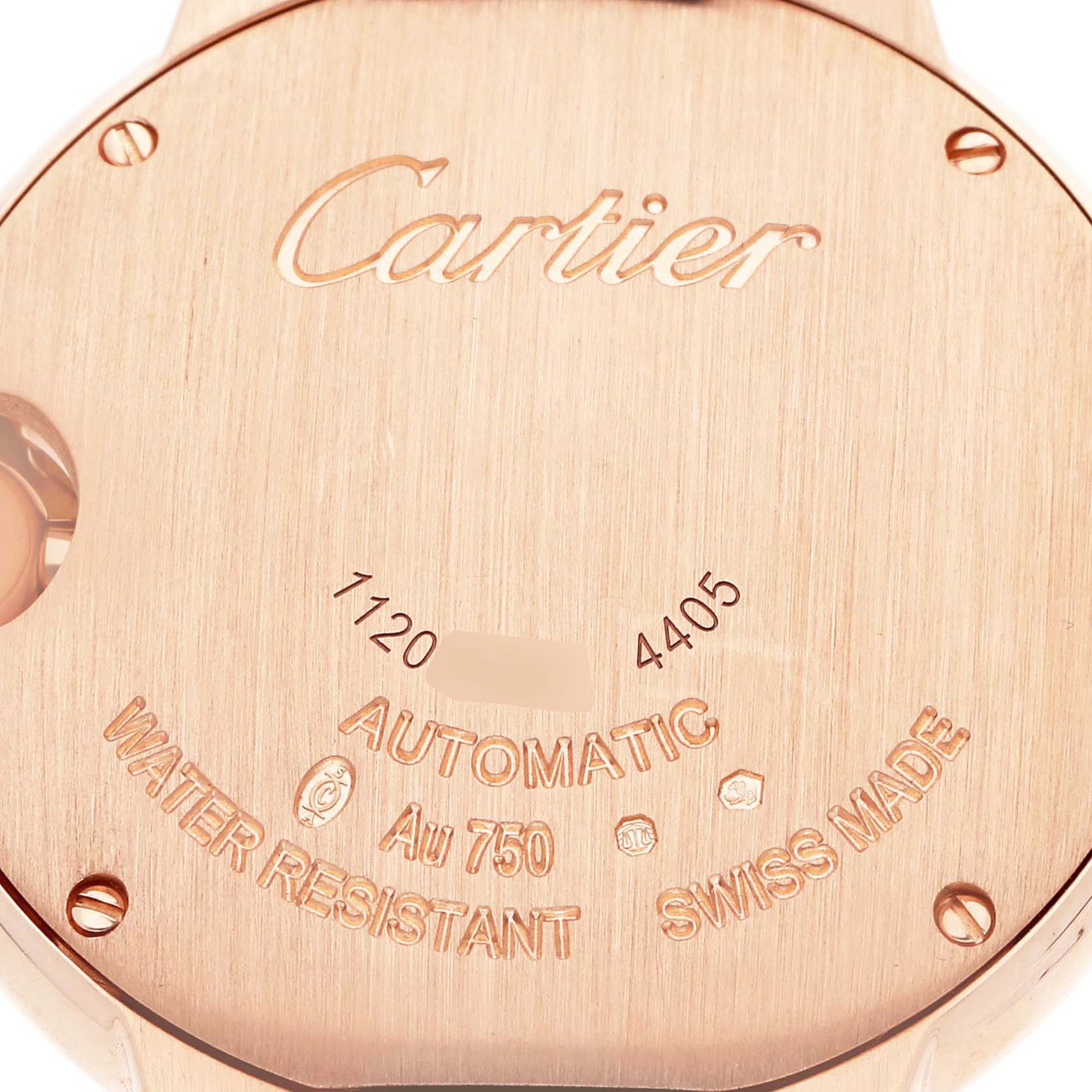 The image shows the back case of a Cartier Ballon Bleu WGBB0052 Men
s Rose Gold Silver Dial watch, displaying engravings and branding details.