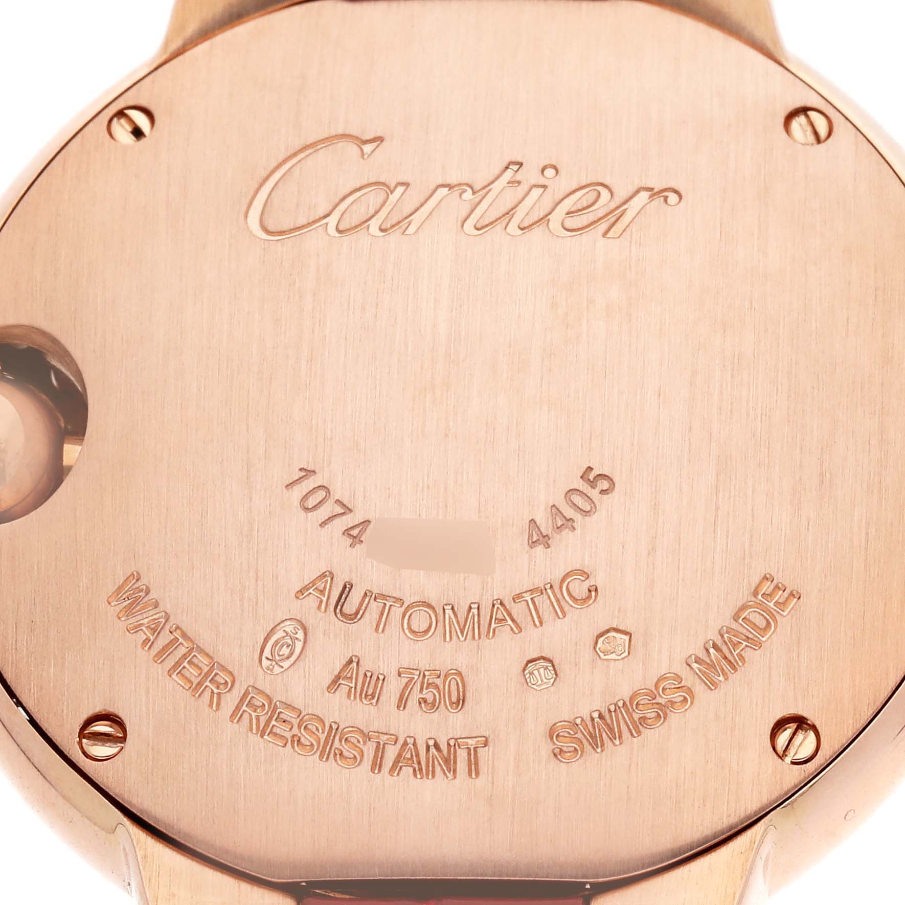 The image shows the back case of a Cartier Ballon Bleu WJBB0080 Women
s Rose Gold Silver Dial watch, displaying the brand logo and specifications.
