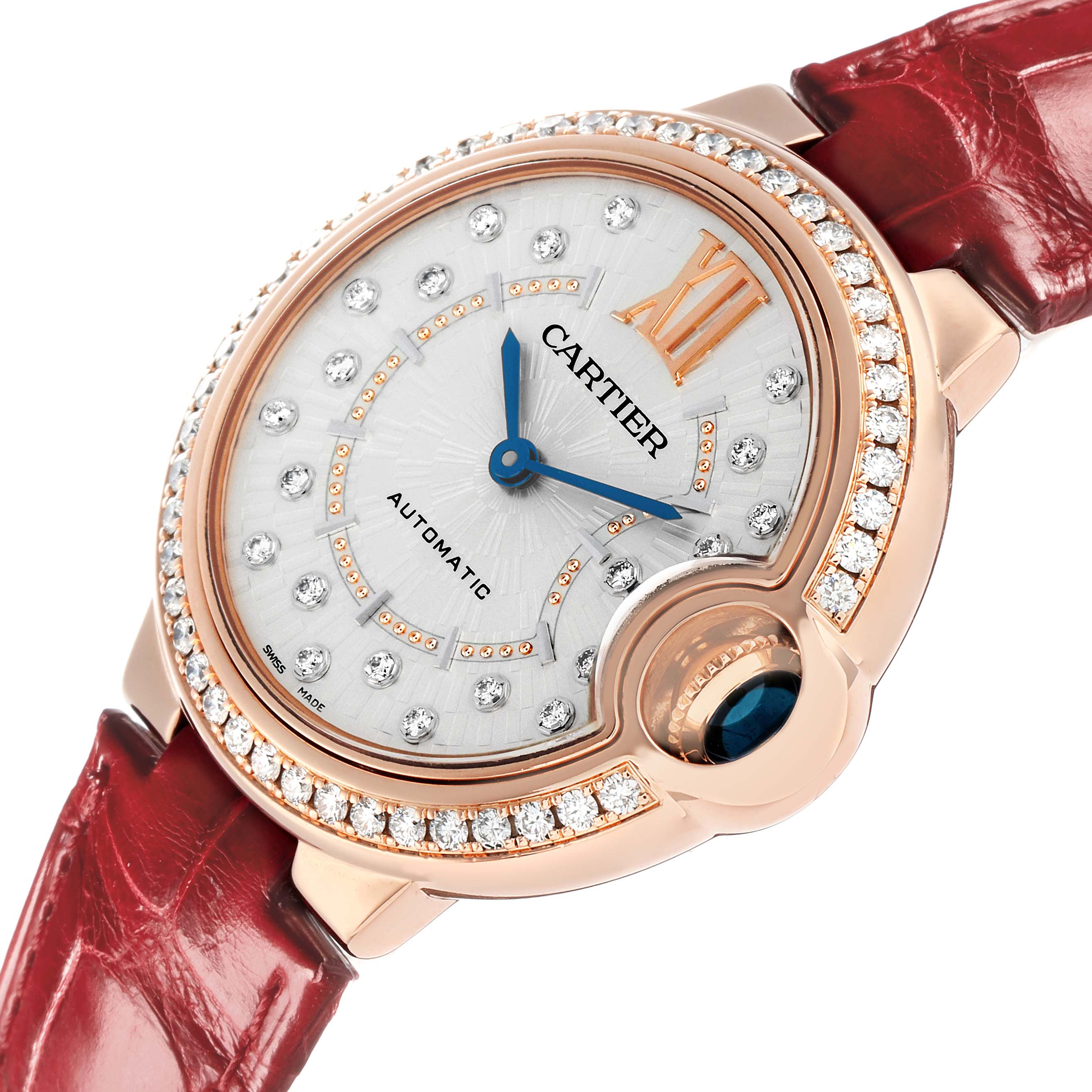 The Cartier Ballon Bleu WJBB0080 Women
s Rose Gold Silver Dial watch is shown from an angled view, highlighting the dial, diamond bezel, and blue sapphire crown.