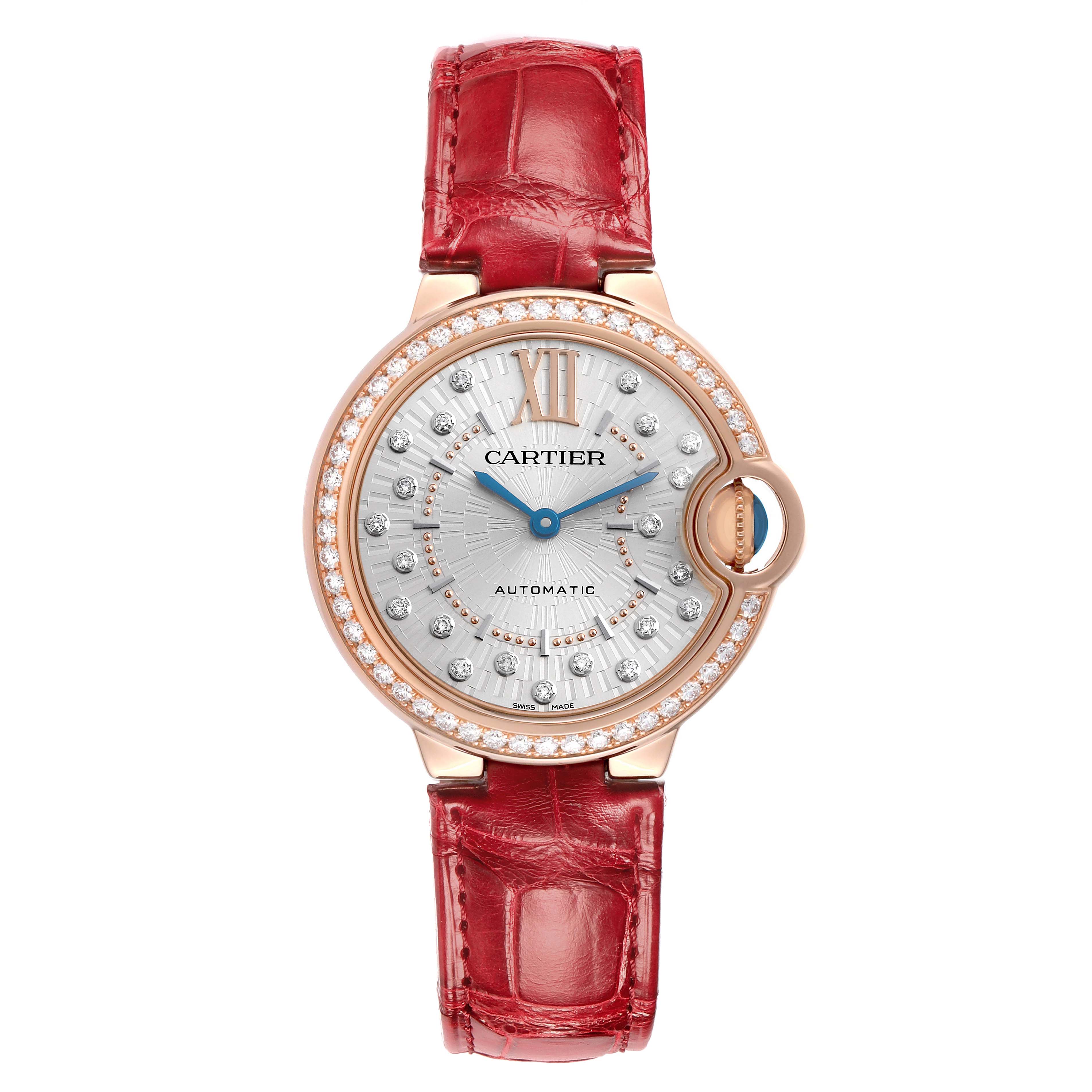 The Cartier Ballon Bleu WJBB0080 Women
s Rose Gold Silver Dial watch is shown from a front angle, displaying its round face, diamond bezel, and red leather strap.