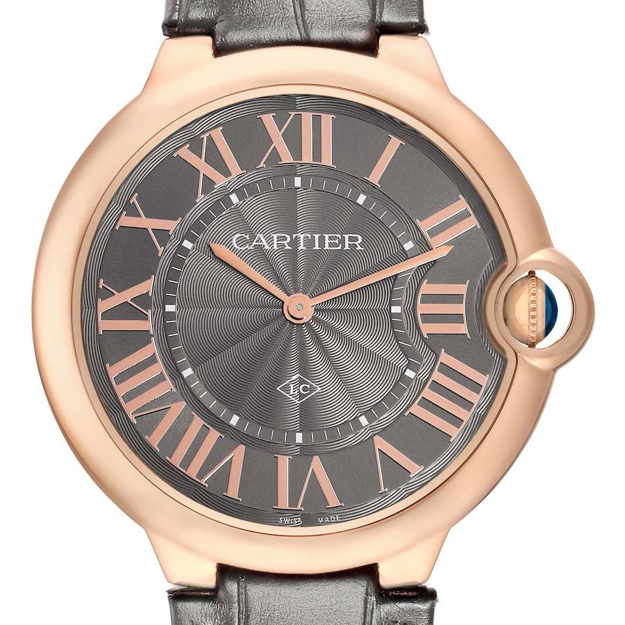 The Cartier Ballon Bleu W6920089 Men
s Rose Gold Grey Dial watch is shown from a front angle, highlighting its dial, Roman numerals, and signature blue cabochon crown.