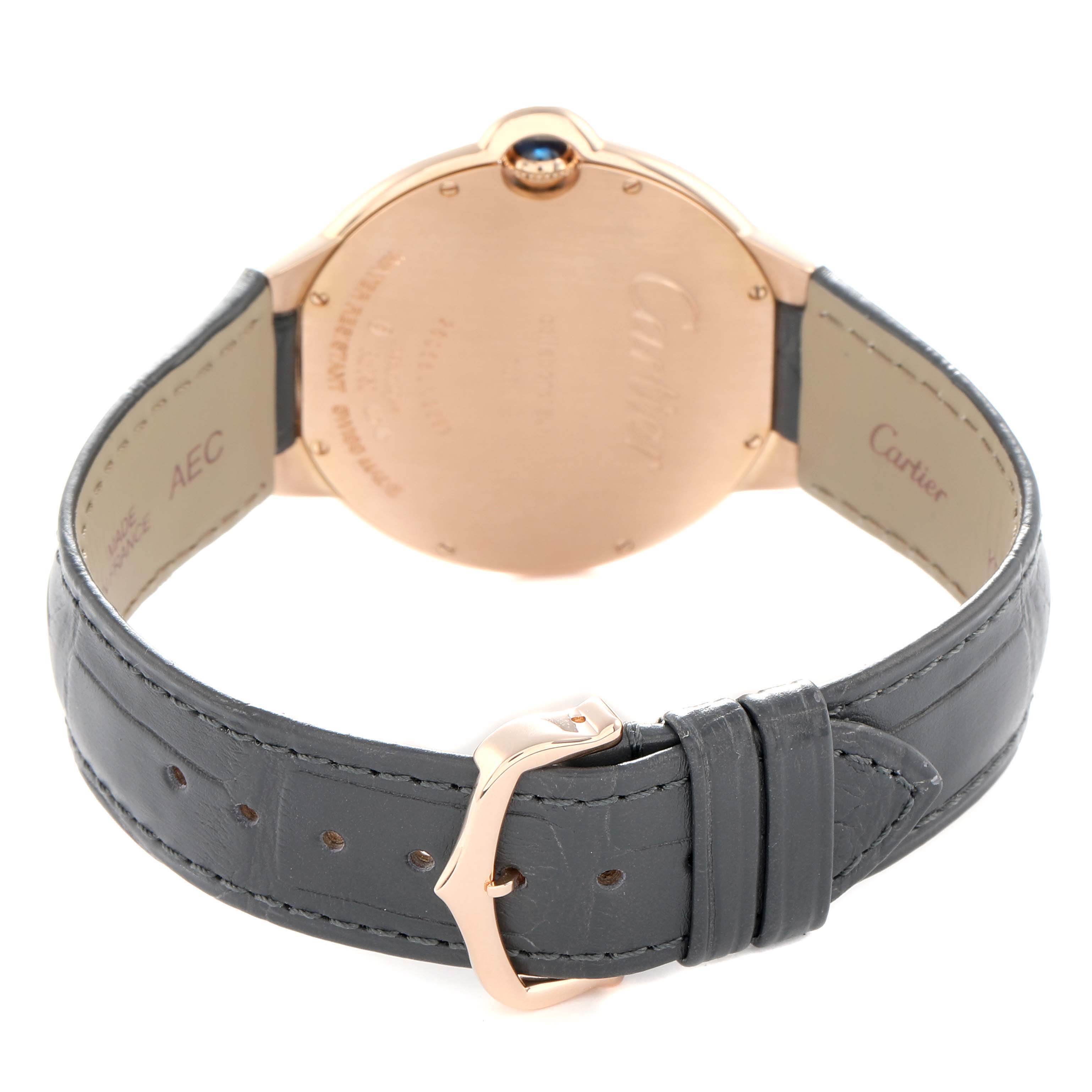 The Cartier Ballon Bleu W6920089 Men
s Rose Gold Grey Dial watch is shown from the back, highlighting the case, crown, and leather strap with buckle.