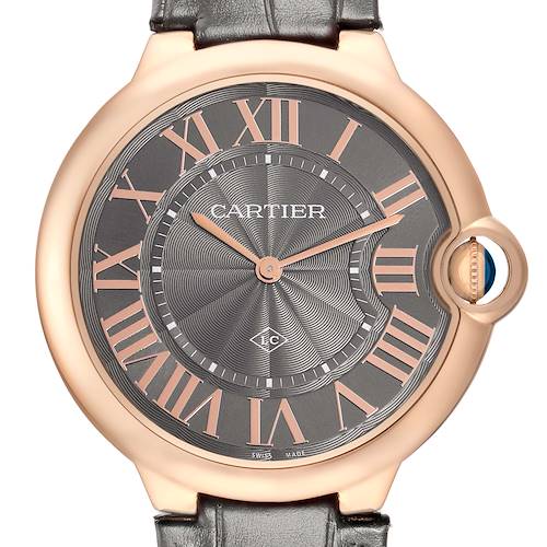The Cartier Ballon Bleu W6920089 Men's Rose Gold Grey Dial watch is shown from a front angle, highlighting the face, Roman numerals, and crown.
