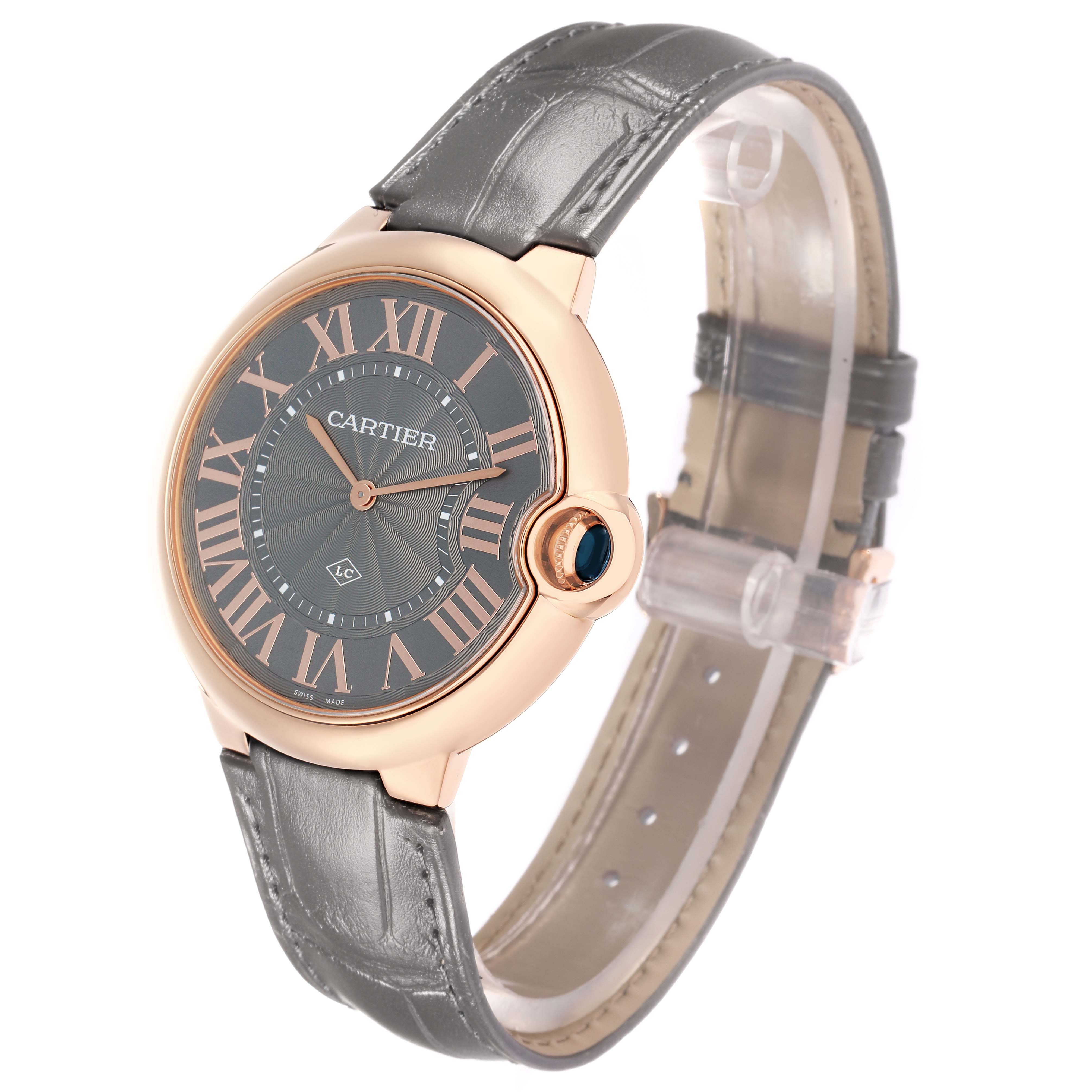 The Cartier Ballon Bleu W6920089 Men
s Rose Gold Grey Dial watch is shown from an angled side view, highlighting its dial, Roman numerals, and leather strap.