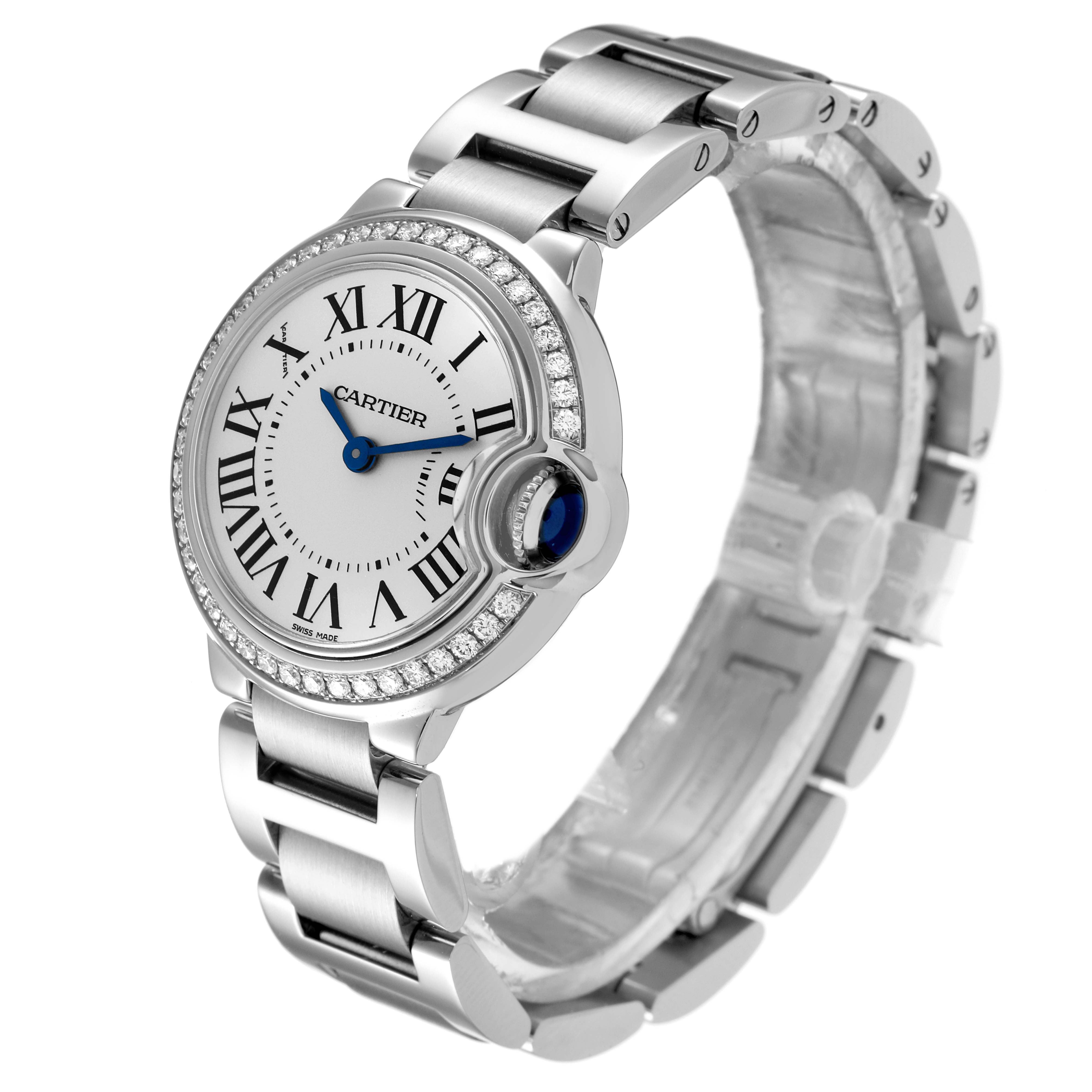 The image shows a Cartier Ballon Bleu W4BB0015 Women
s Stainless Steel Silver Dial W4BB0015 Women
s Stainless Steel Silver Dial watch at an angle, highlighting its round face, metal bracelet, and diamond-studded bezel.