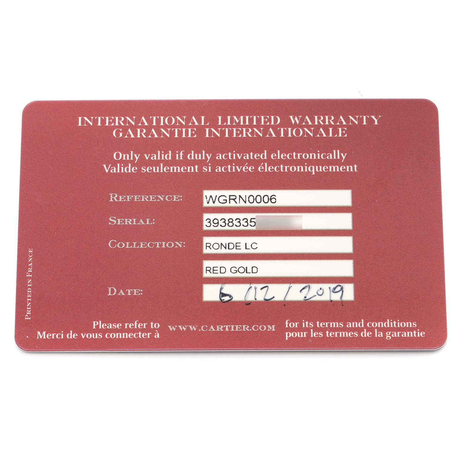The image shows an international limited warranty card for the Cartier Ronde WGRN0006 Men
s Rose Gold Silver Dial model, detailing reference, serial, collection, and date.