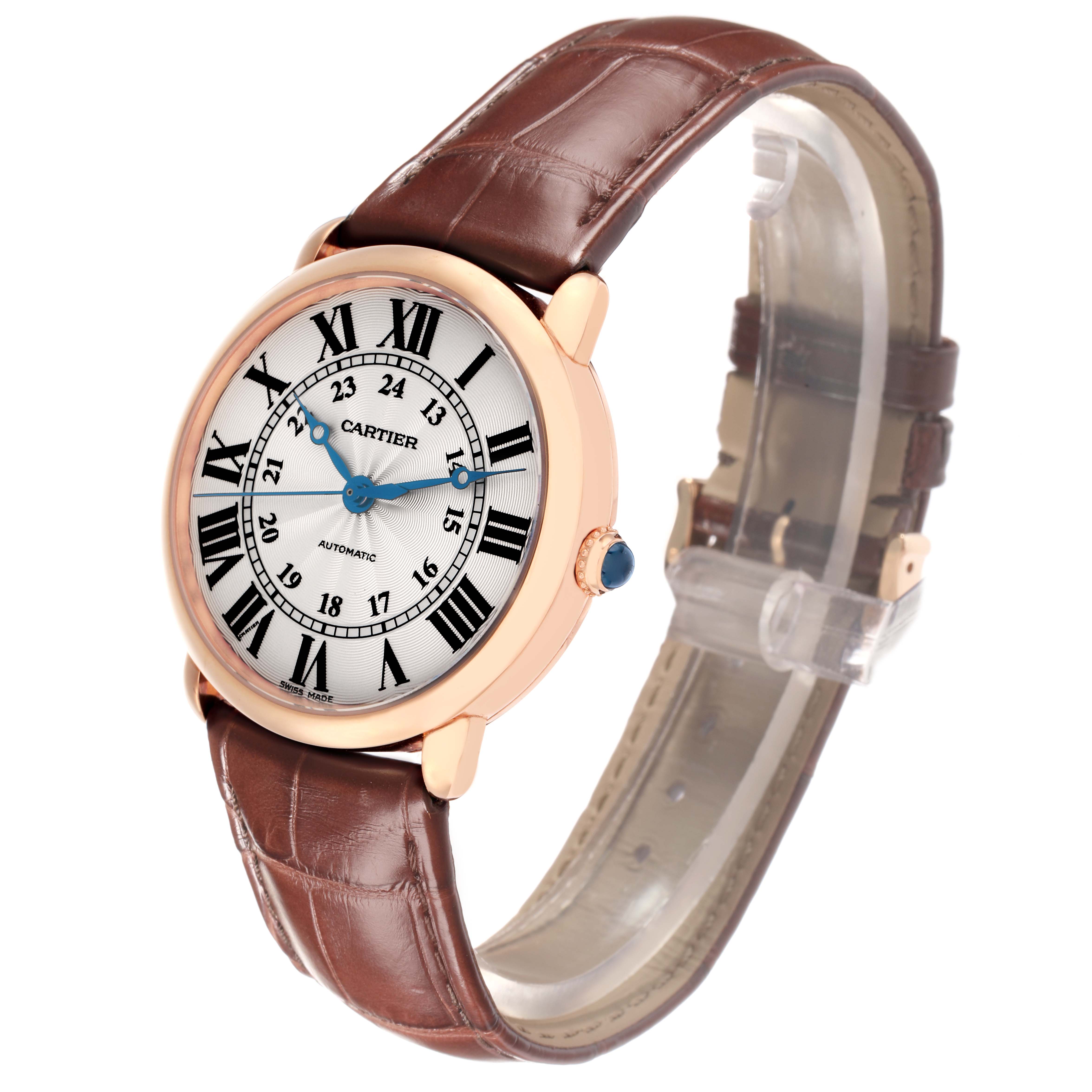 The Cartier Ronde WGRN0006 Men
s Rose Gold Silver Dial watch is shown at a three-quarter angle highlighting the face, crown, and brown leather strap.