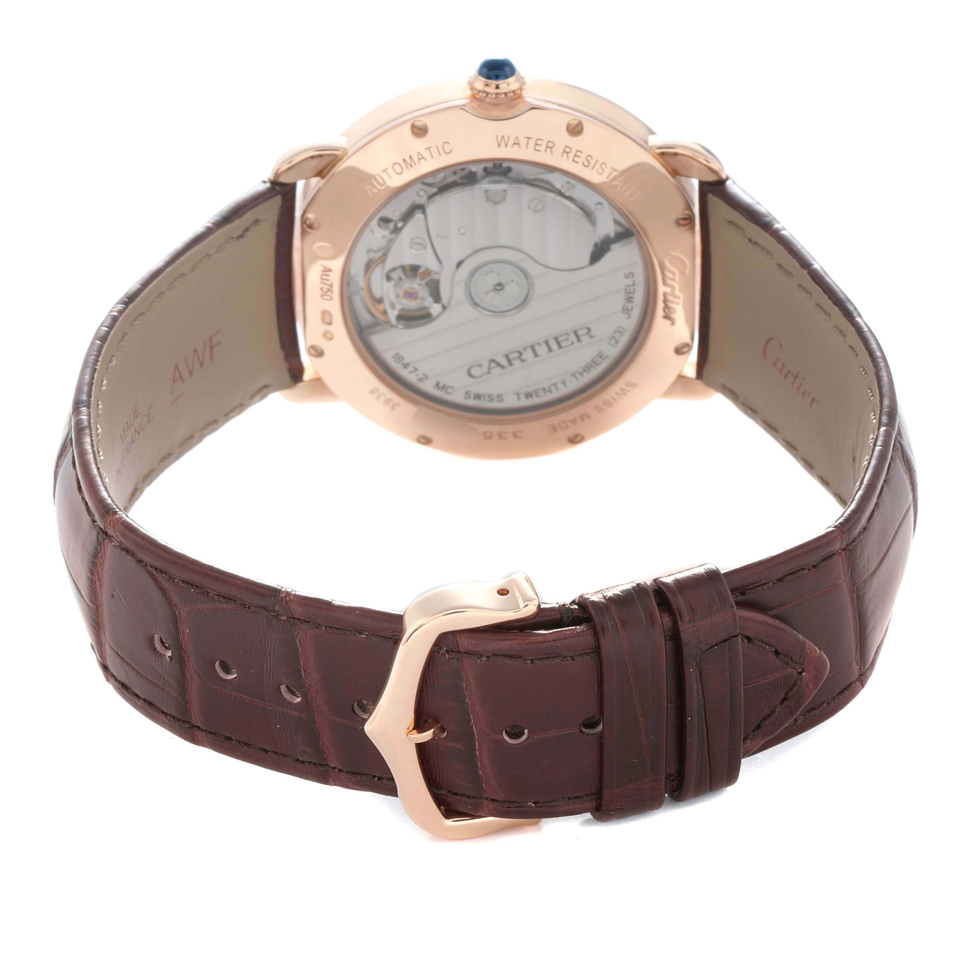 The image shows the back of a Cartier Ronde WGRN0006 Men
s Rose Gold Silver Dial watch, highlighting the movement and leather strap.