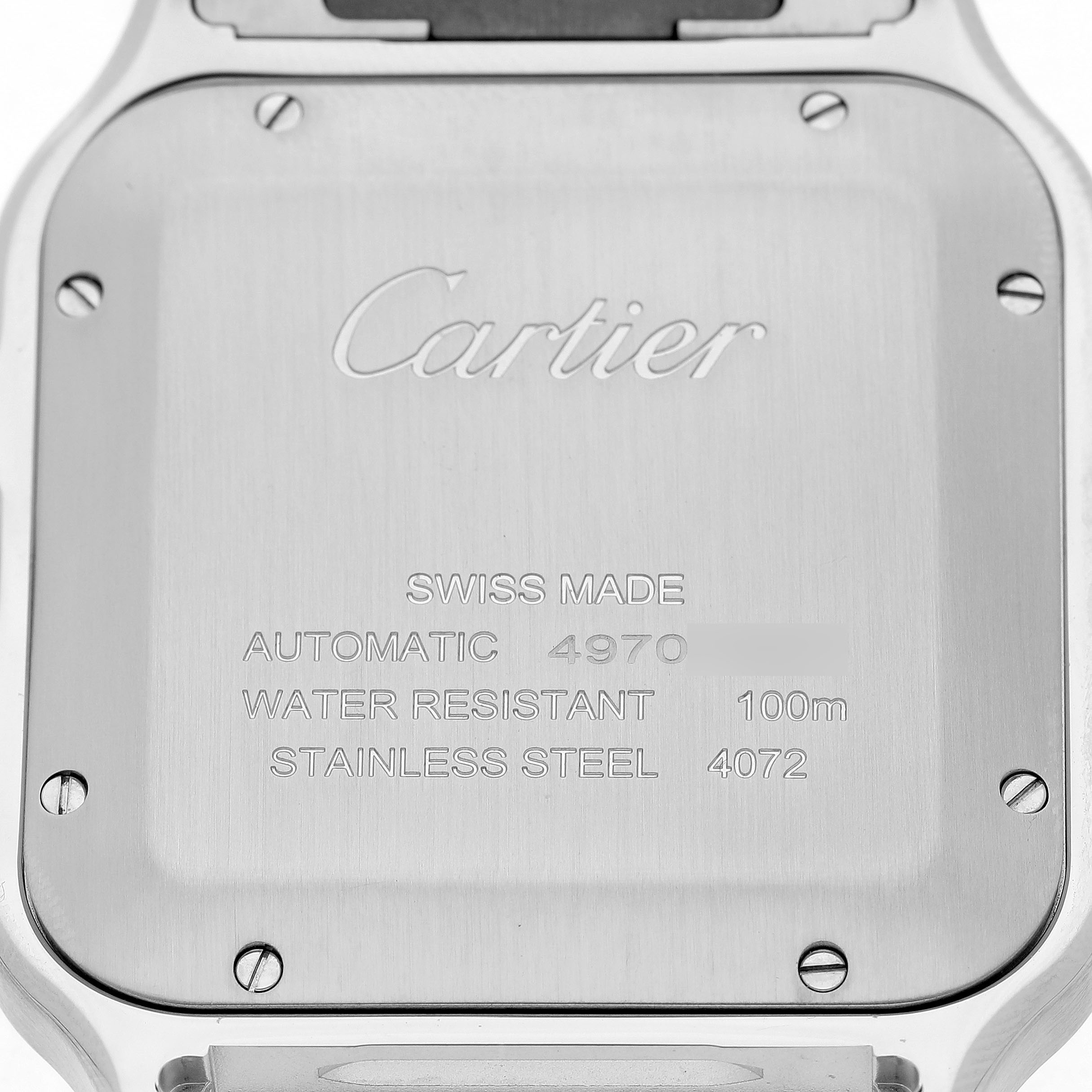 The image shows the back case of a Cartier Santos WSSA0062 Men's Stainless Steel Green Dial watch, displaying engraved specifications and branding details.