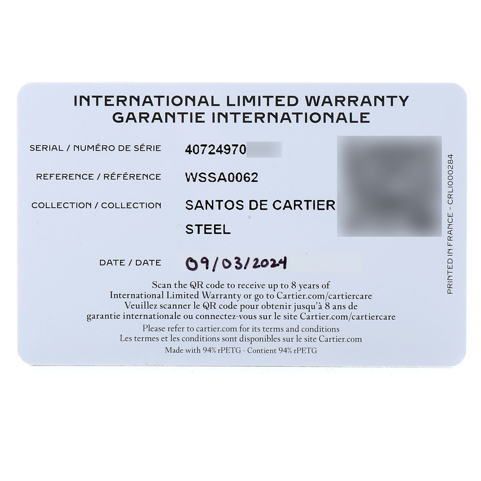 The image shows an International Limited Warranty card for the Santos de Cartier watch model.