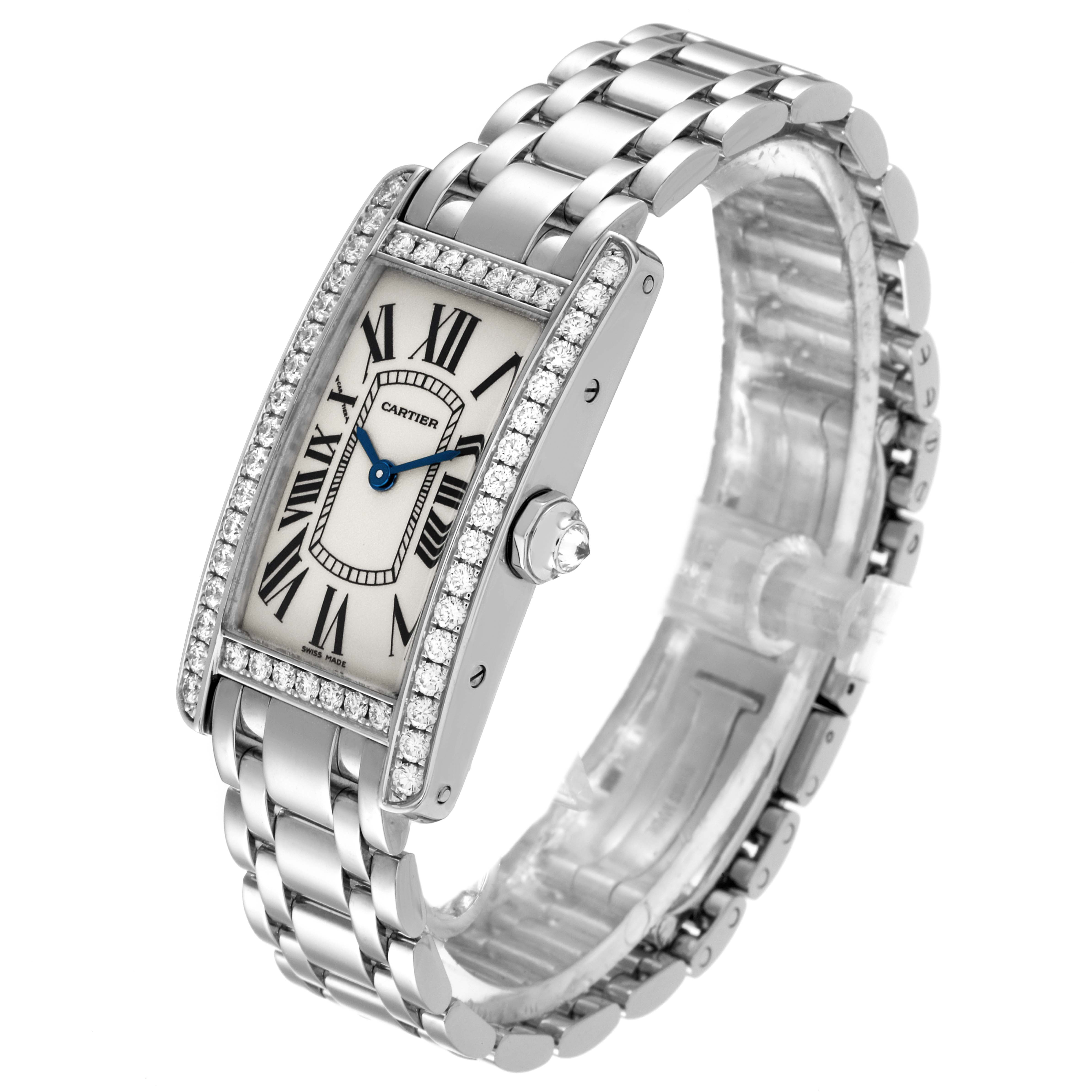 The image shows a Cartier Tank Americaine WB7073L1 Women
s White Gold Silver Dial WB7073L1 Women
s White Gold Silver Dial watch at a three-quarter angle, highlighting its face, bezel, and bracelet.