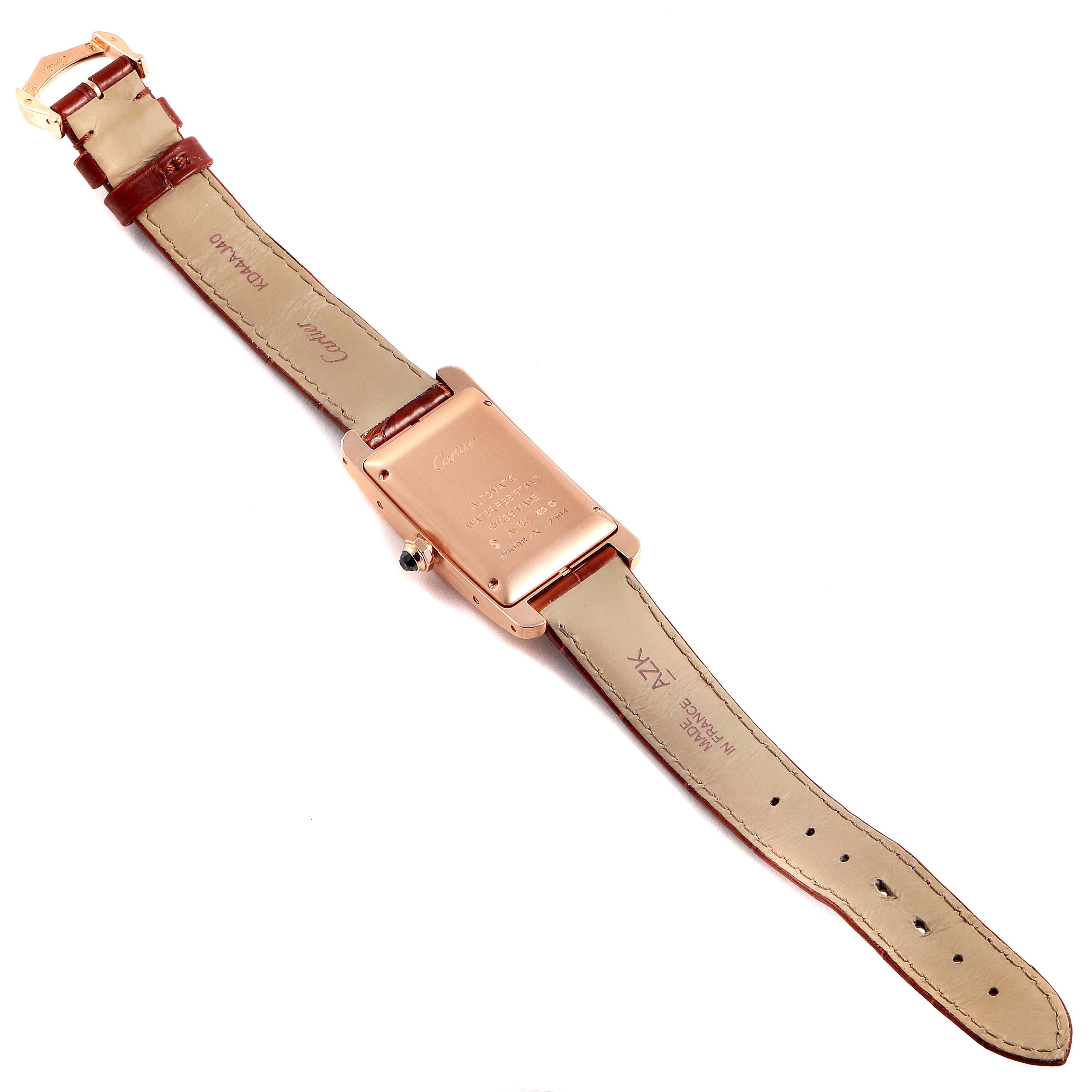 The image shows the back view of the Cartier Tank Americaine W2620030 Women's Rose Gold Silver Dial W2620030 Women's Rose Gold Silver Dial watch, highlighting the straps and the case back.