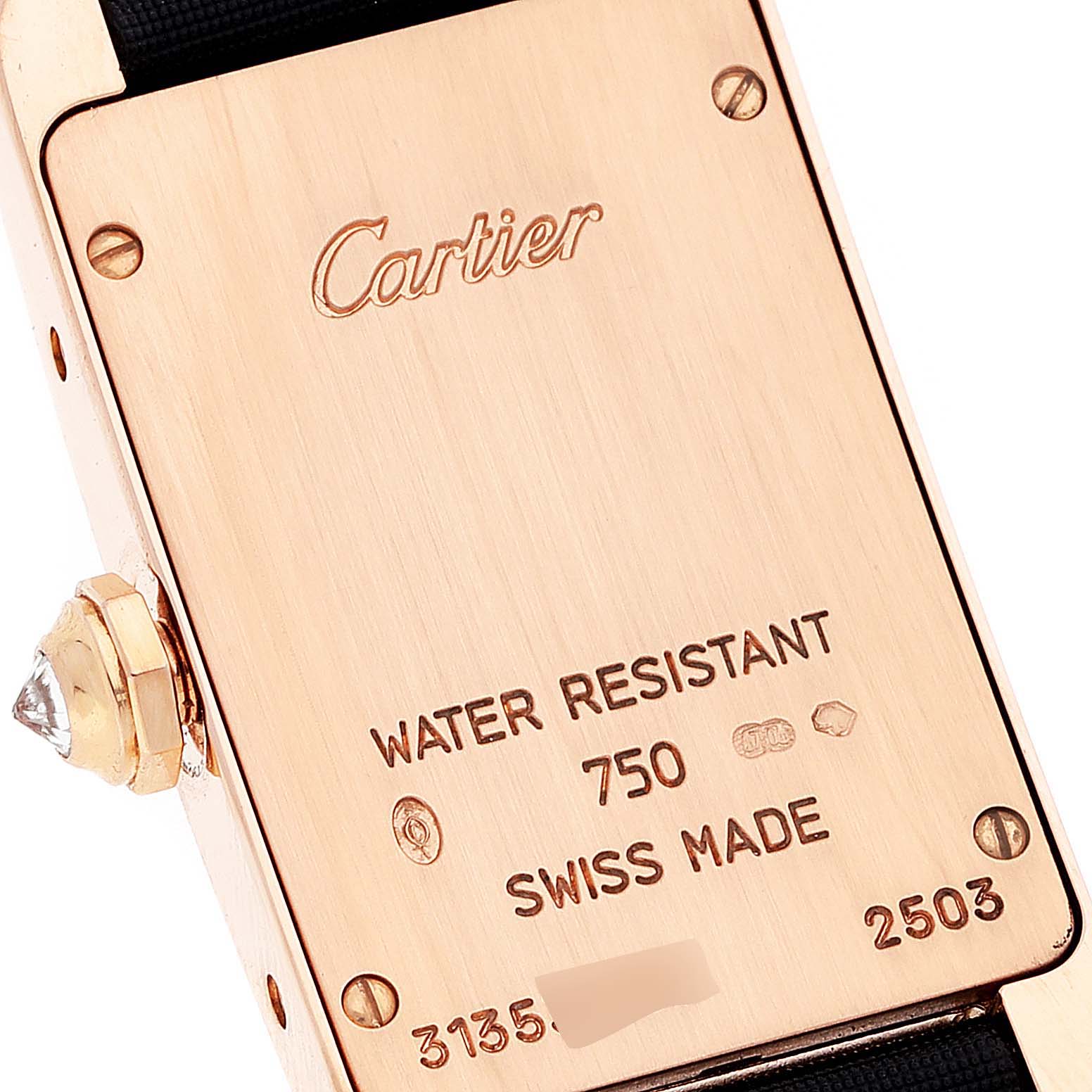 This image shows the back case of a Cartier Tank Américaine watch, highlighting the brand, model, water resistance, and serial number.