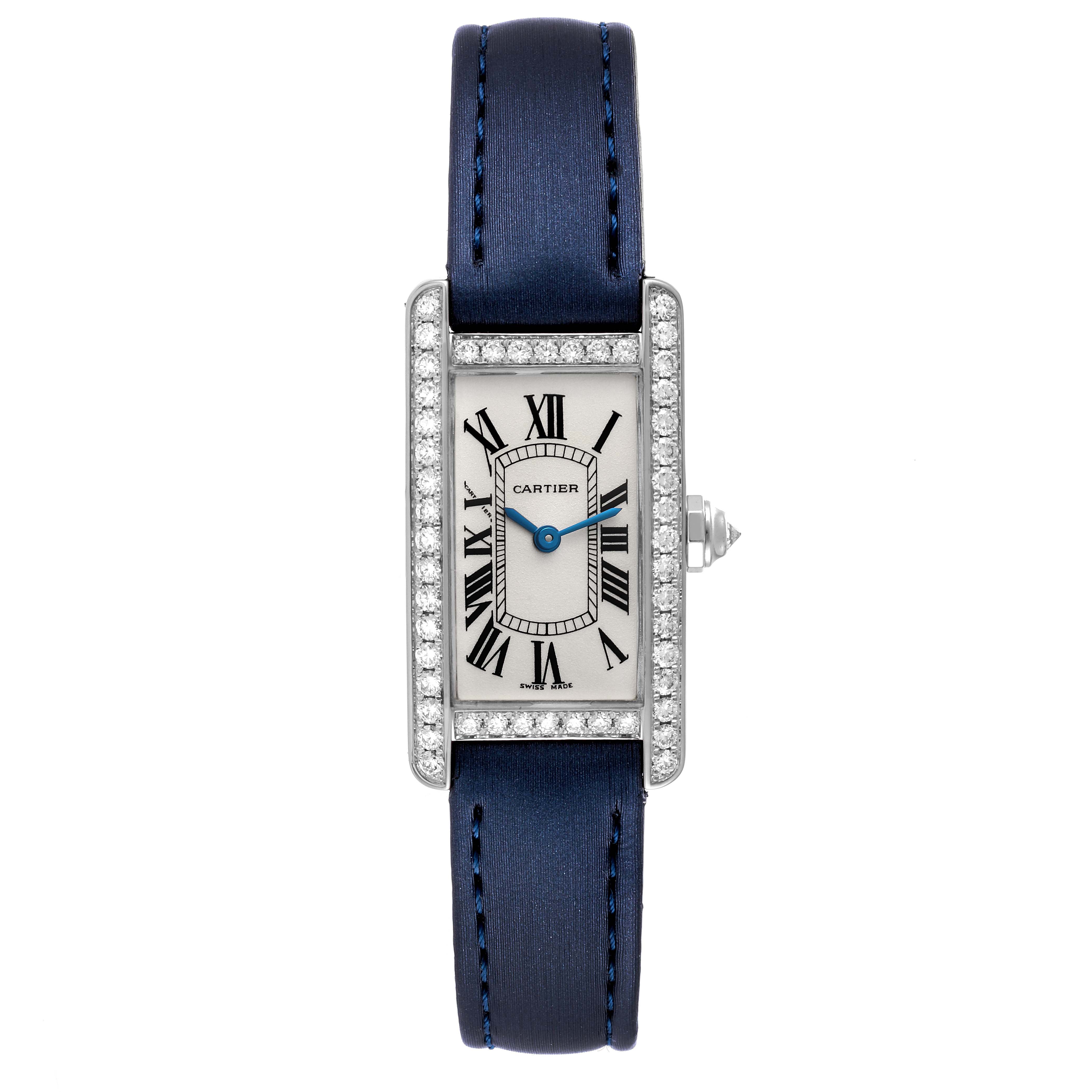 This image shows a front view of a Cartier Tank Americaine WB7018L1 Women's White Gold Silver Dial WB7018L1 Women's White Gold Silver Dial watch, highlighting its rectangular face, Roman numerals, and blue strap.