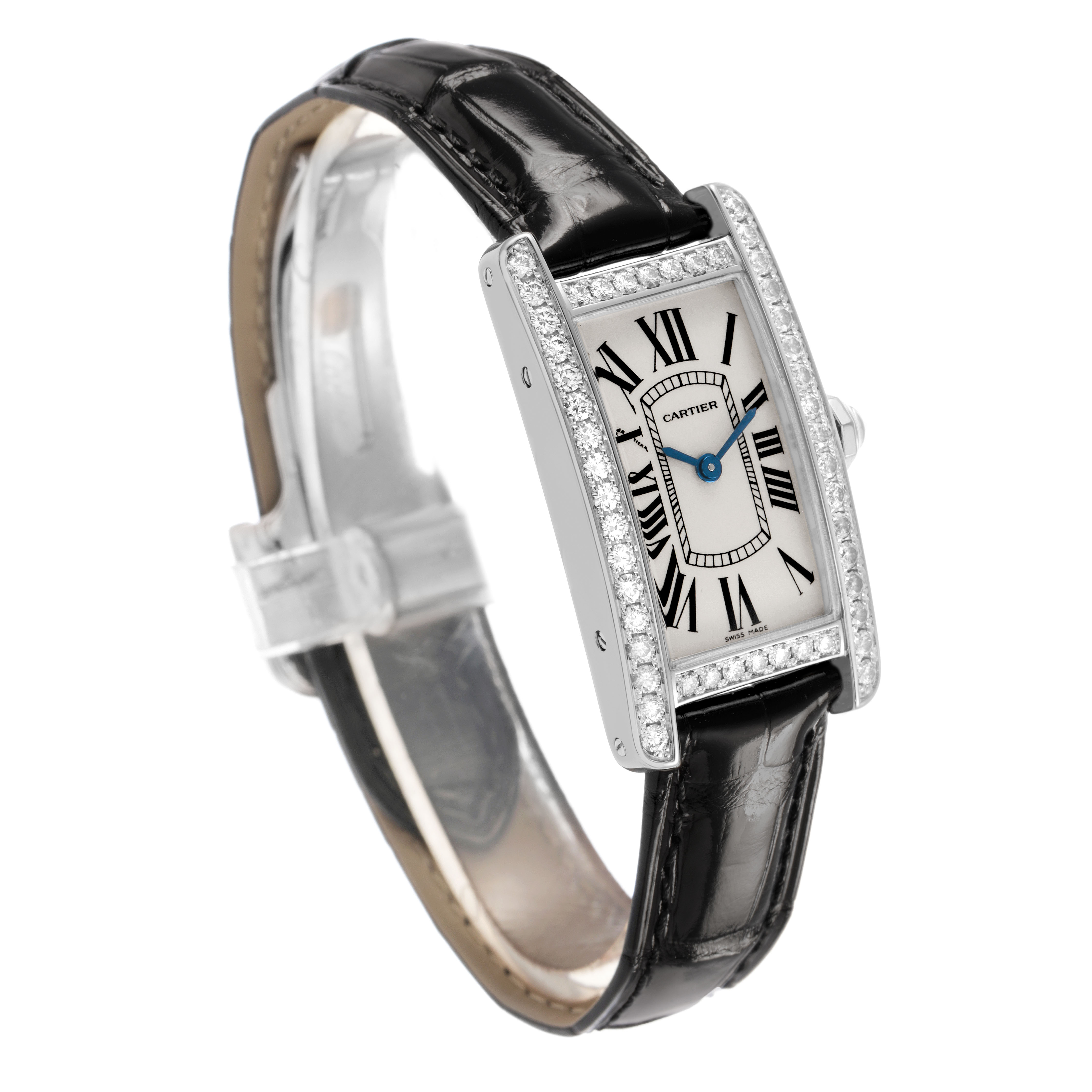 The Cartier Tank Americaine WB707331 Women's White Gold Silver Dial watch is shown at a three-quarter angle, featuring the face, diamond bezel, and black leather strap.