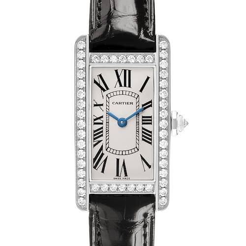 The Cartier Tank Americaine WB707331 Women's White Gold Silver Dial watch is shown from the front, highlighting its rectangular face, Roman numerals, and diamond bezel.