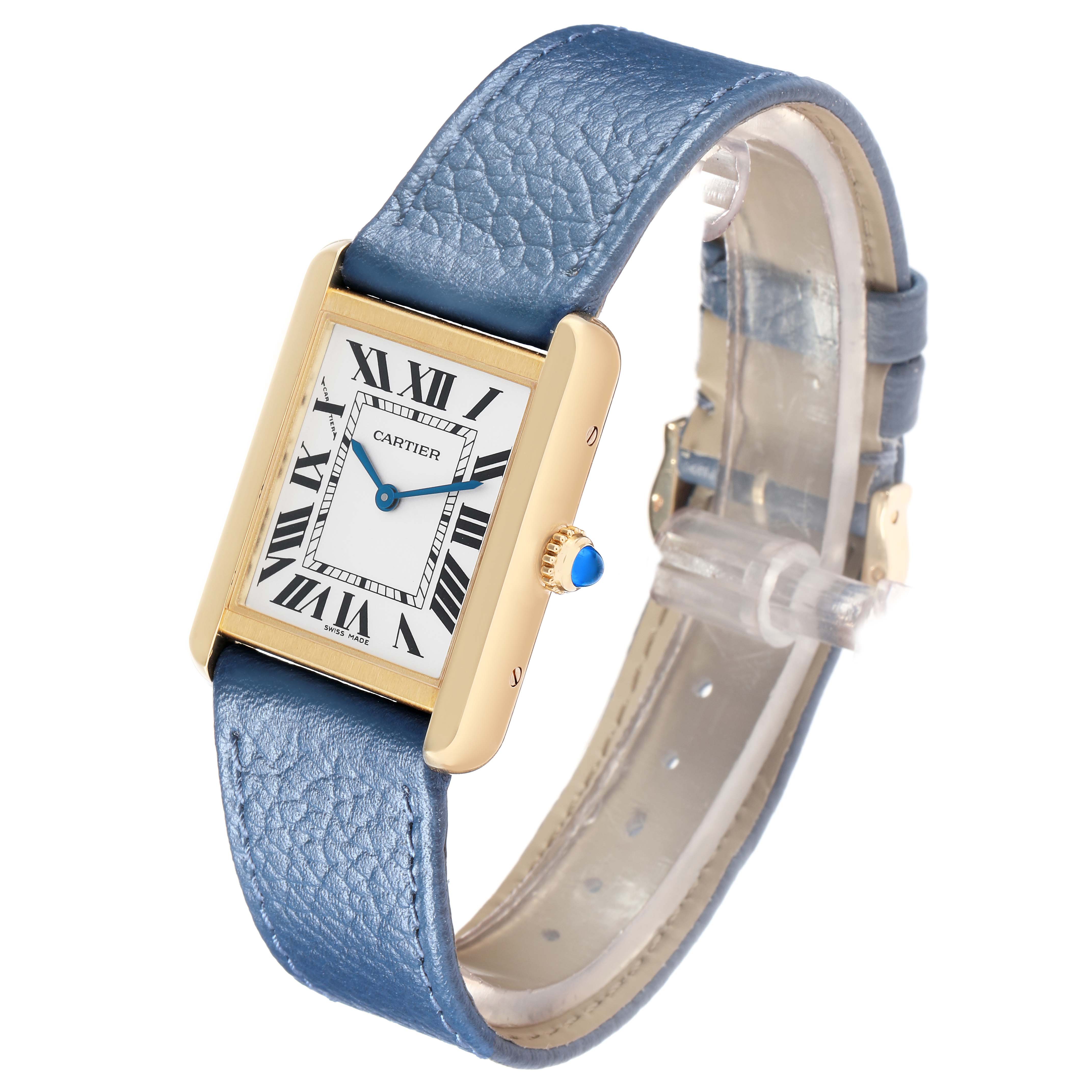 The Cartier Tank Solo W5200002 Women
s Yellow Gold Silver Dial watch is shown at a slight angle, displaying the face, Roman numerals, blue hands, and textured blue strap.