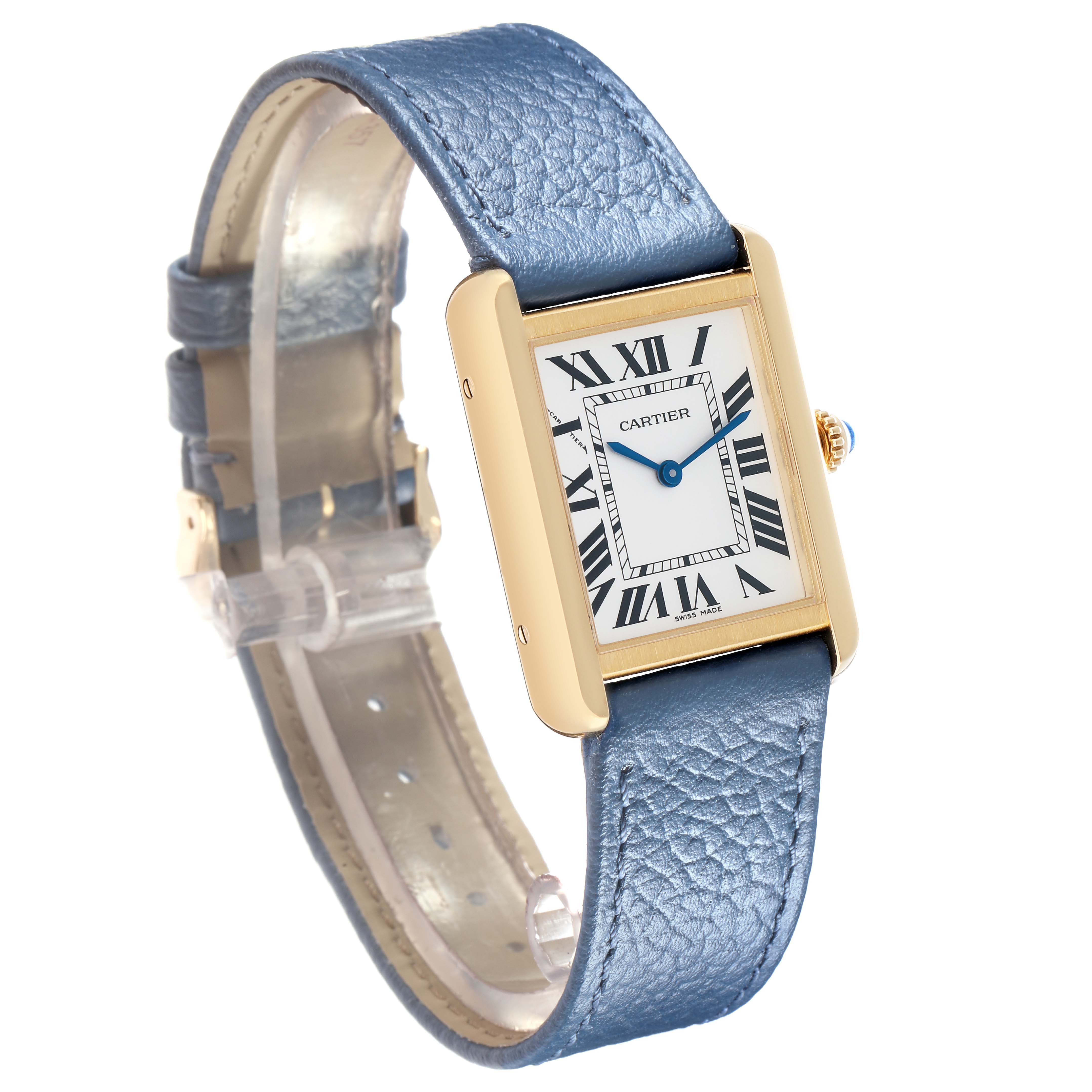 The Cartier Tank Solo W5200002 Women
s Yellow Gold Silver Dial watch is shown at an angle highlighting its face, gold case, blue leather strap, and visible crown.