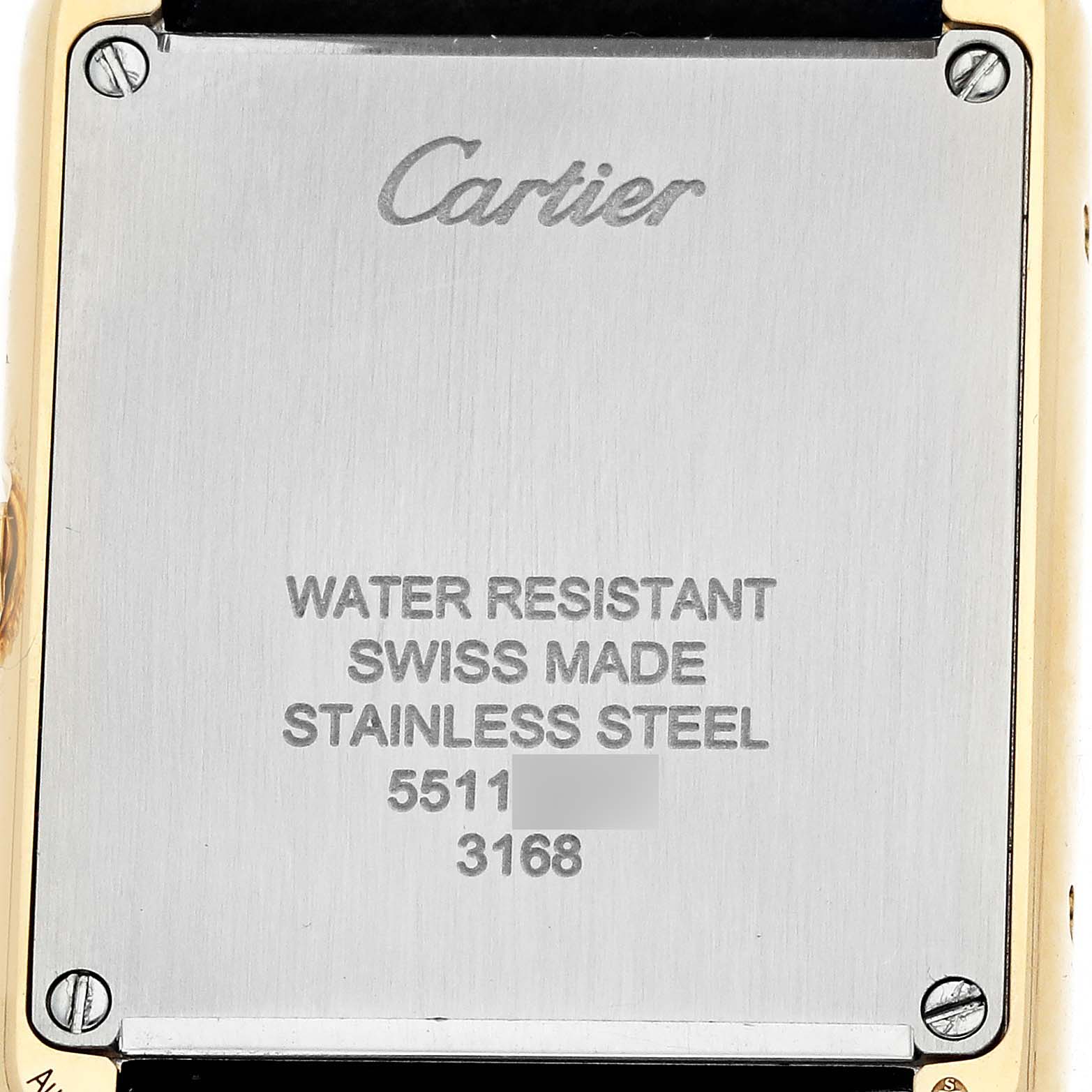 The image shows the back case of the Cartier Tank Solo W5200002 Women
s Yellow Gold Silver Dial watch, highlighting its stainless steel composition and specifications.