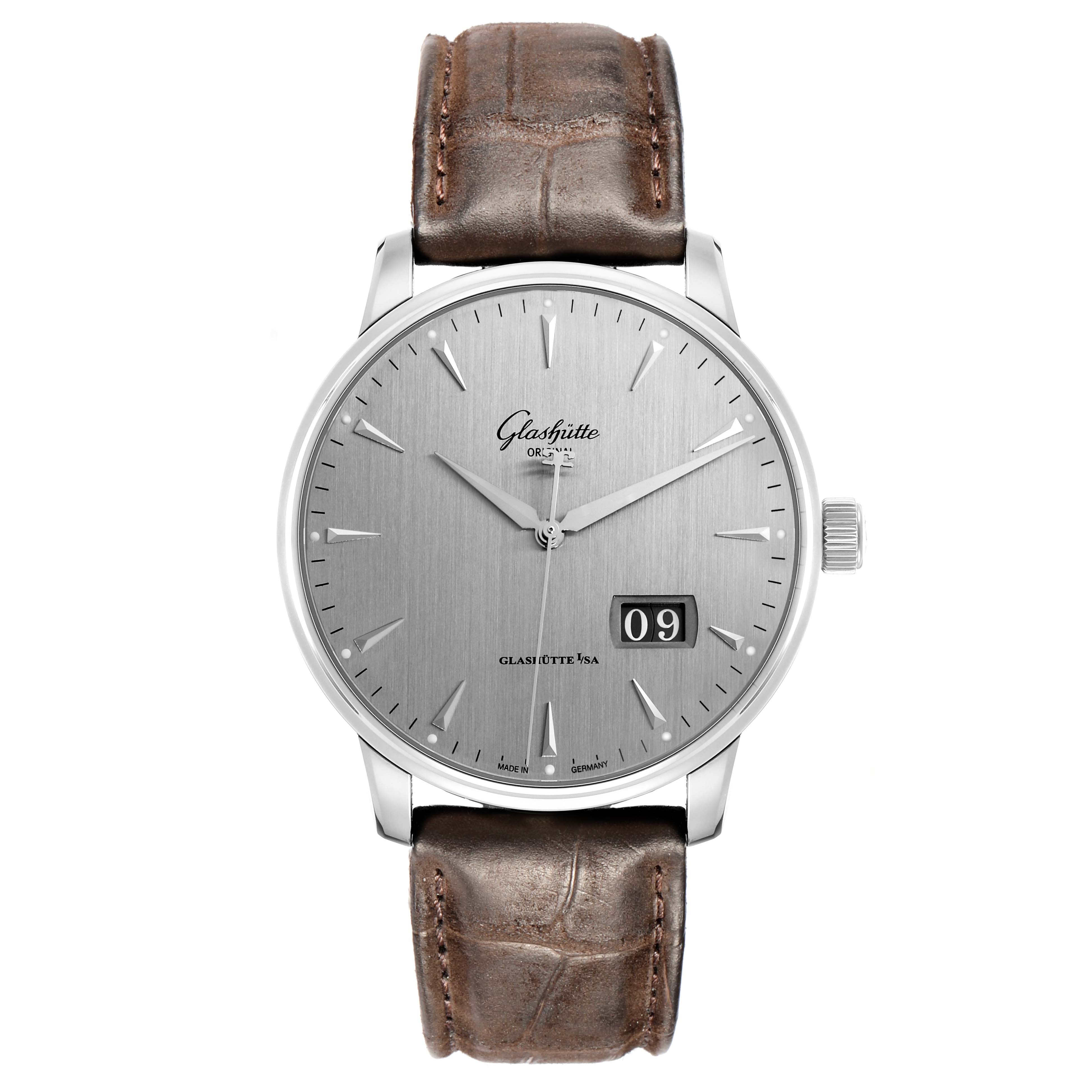 The image shows a frontal view of the Glashutte Senator 1-36-03-03-02-31 Men
s Stainless Steel Silver Dial watch, highlighting the dial, hands, date window, and brown leather strap.