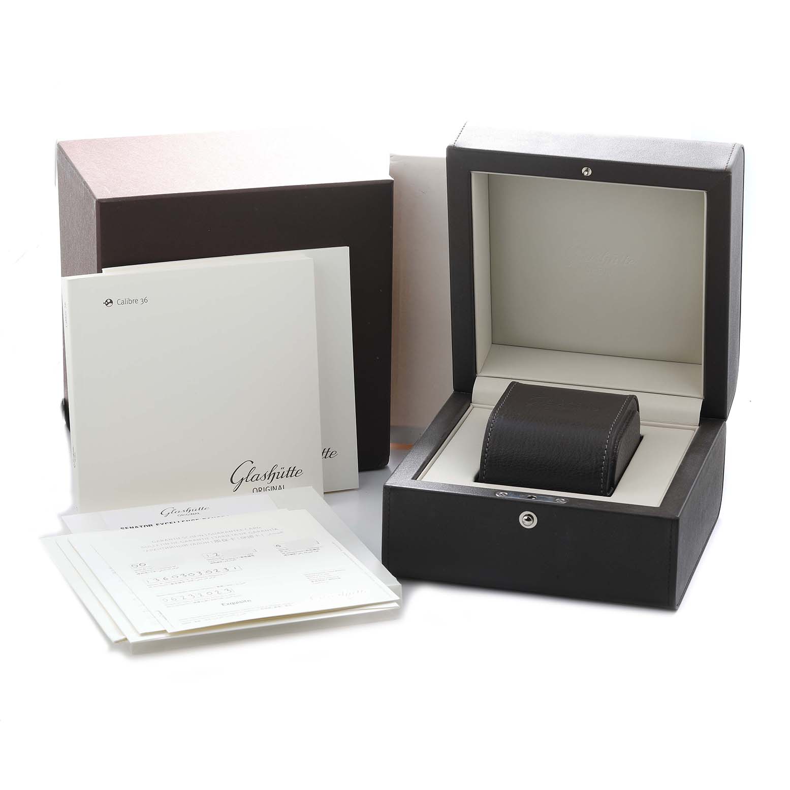 The image shows the Glashütte Senator model packaging, including a display box, pillow, and documents from a front angle.