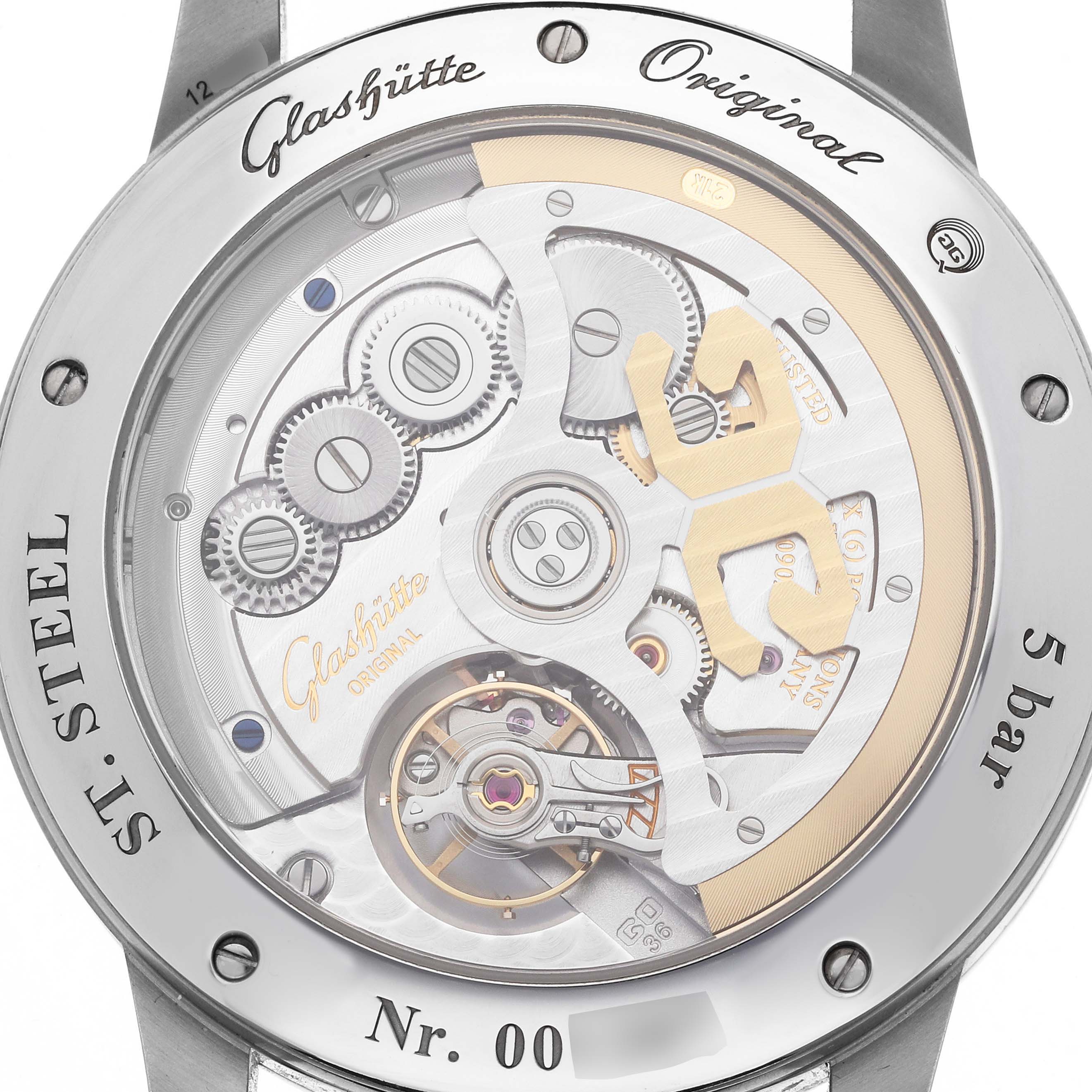 The image shows the back of a Glashütte Senator watch, revealing its intricate mechanical movement.