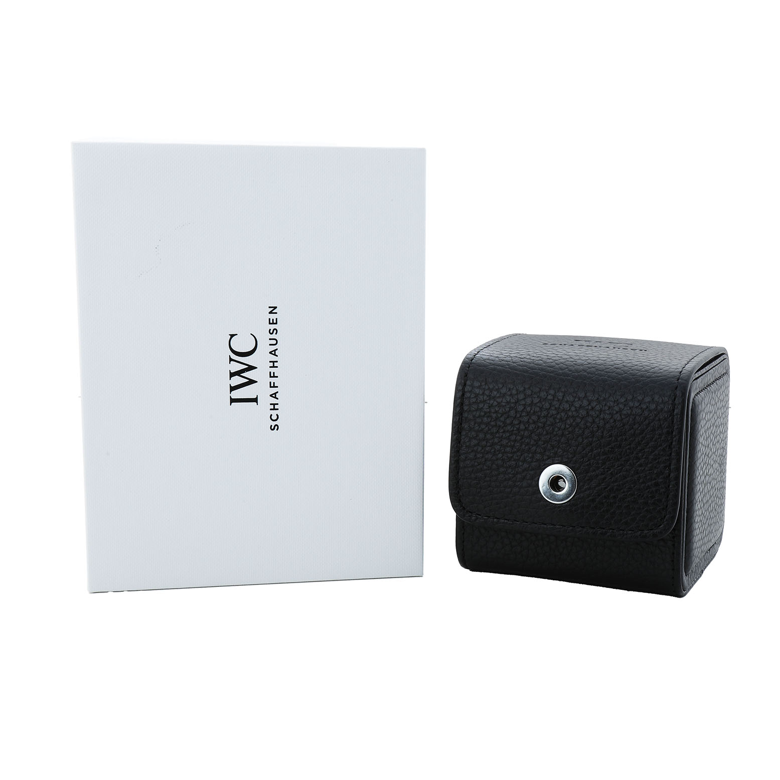 The IWC Pilot IW324703 Men's Ceramic Blue Dial model accessories shown are a black textured box and a white branded case, viewed from the front.
