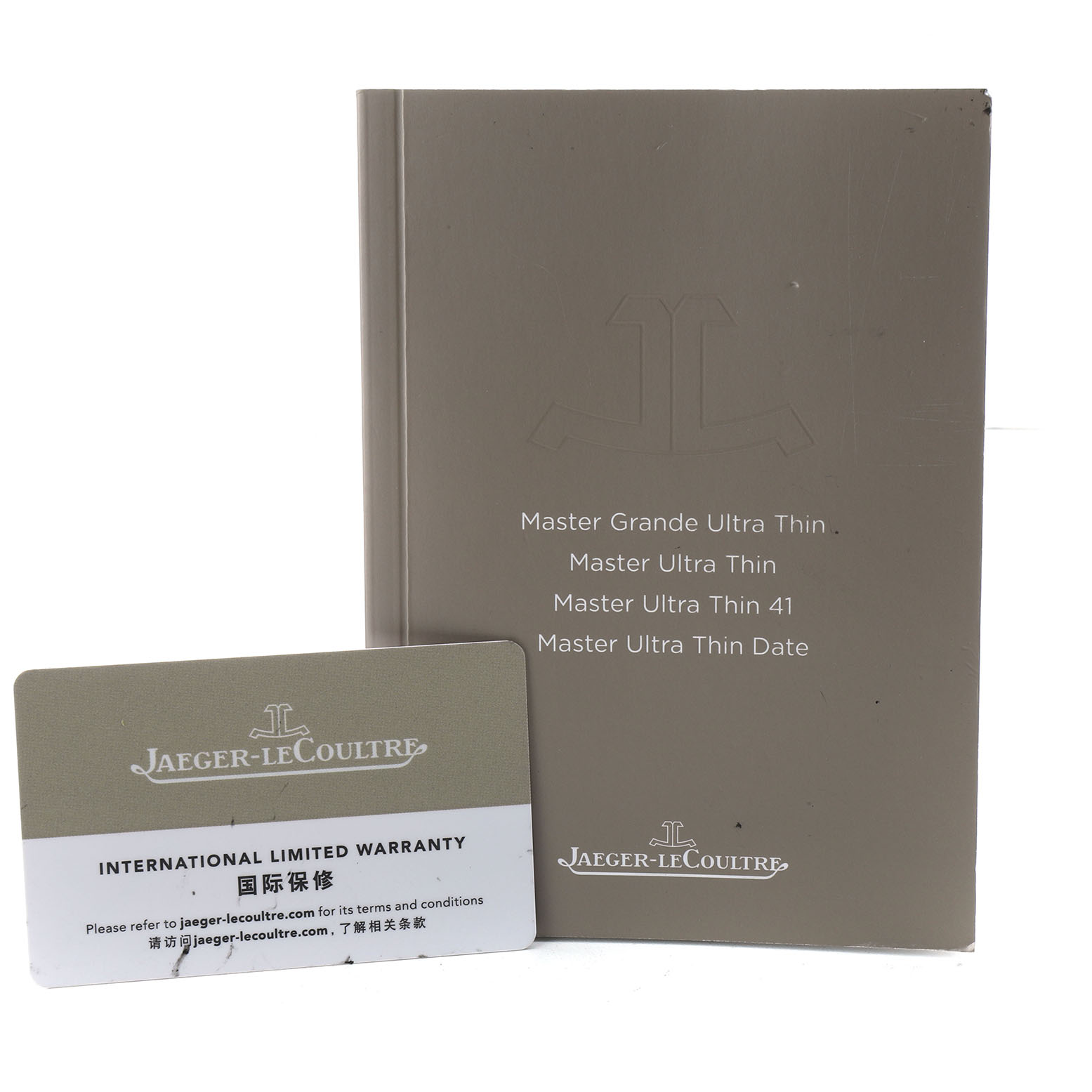 The image shows a Jaeger-LeCoultre Master model warranty card and instruction booklet viewed from the front.