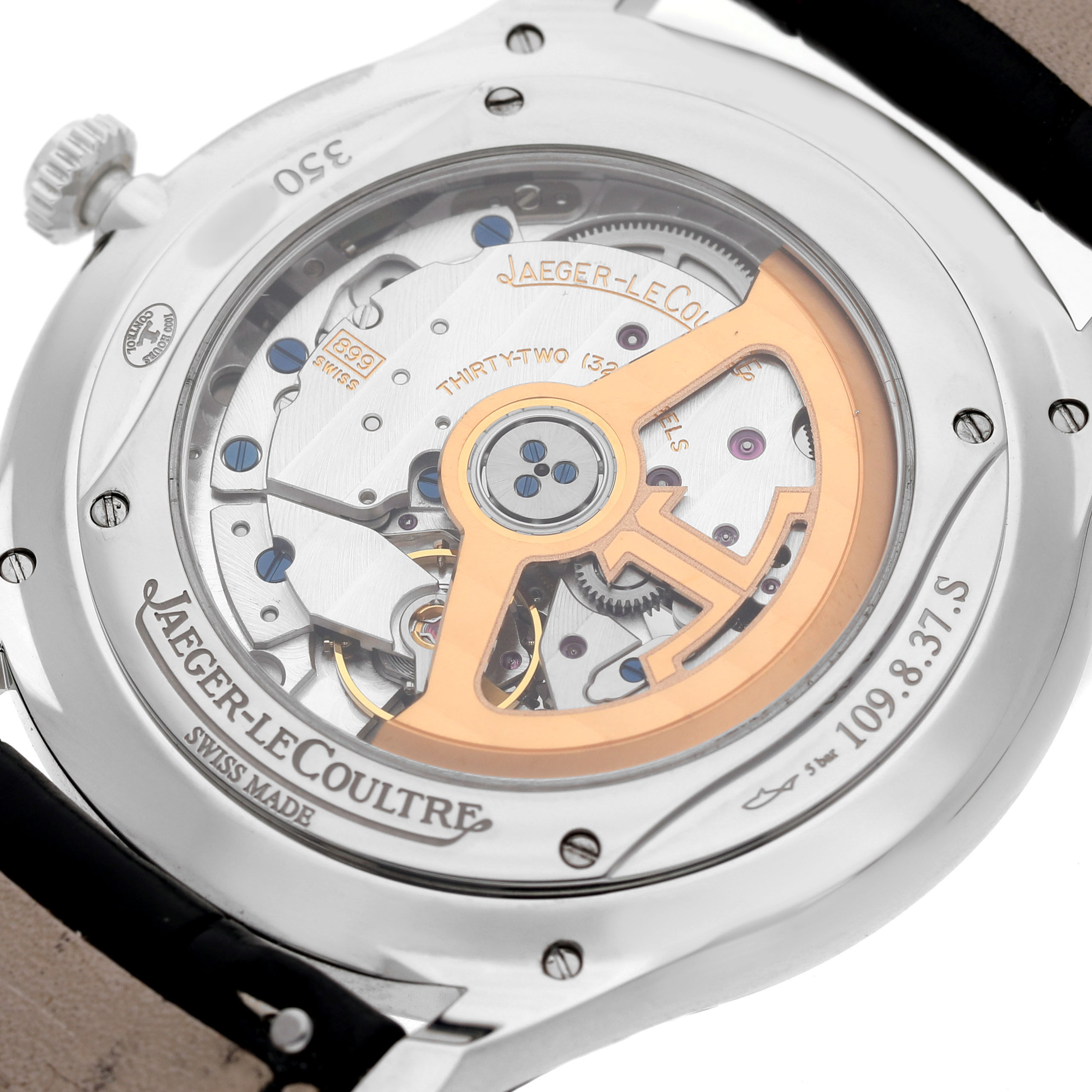 The image shows a Jaeger LeCoultre Master Q1238420 Men's Stainless Steel Silver Dial model from the back, displaying its intricate movement and rotor.