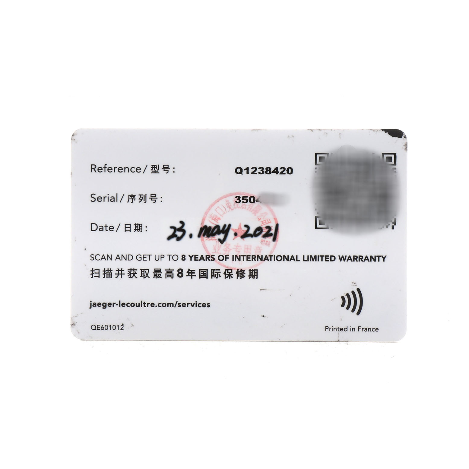 The image shows a warranty card for the Jaeger-LeCoultre Master model, displaying reference, serial numbers, and warranty details.