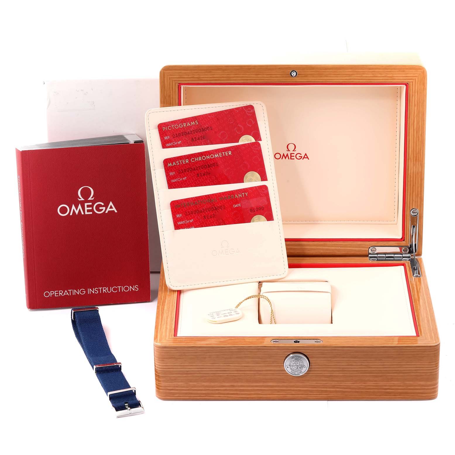 The image shows accessories for the Omega Seamaster 210.30.42.20.03.001 Men's Stainless Steel Blue Dial 210.30.42.20.03.001 Men's Stainless Steel Blue Dial, including a box, operating instructions, a strap, and warranty cards.