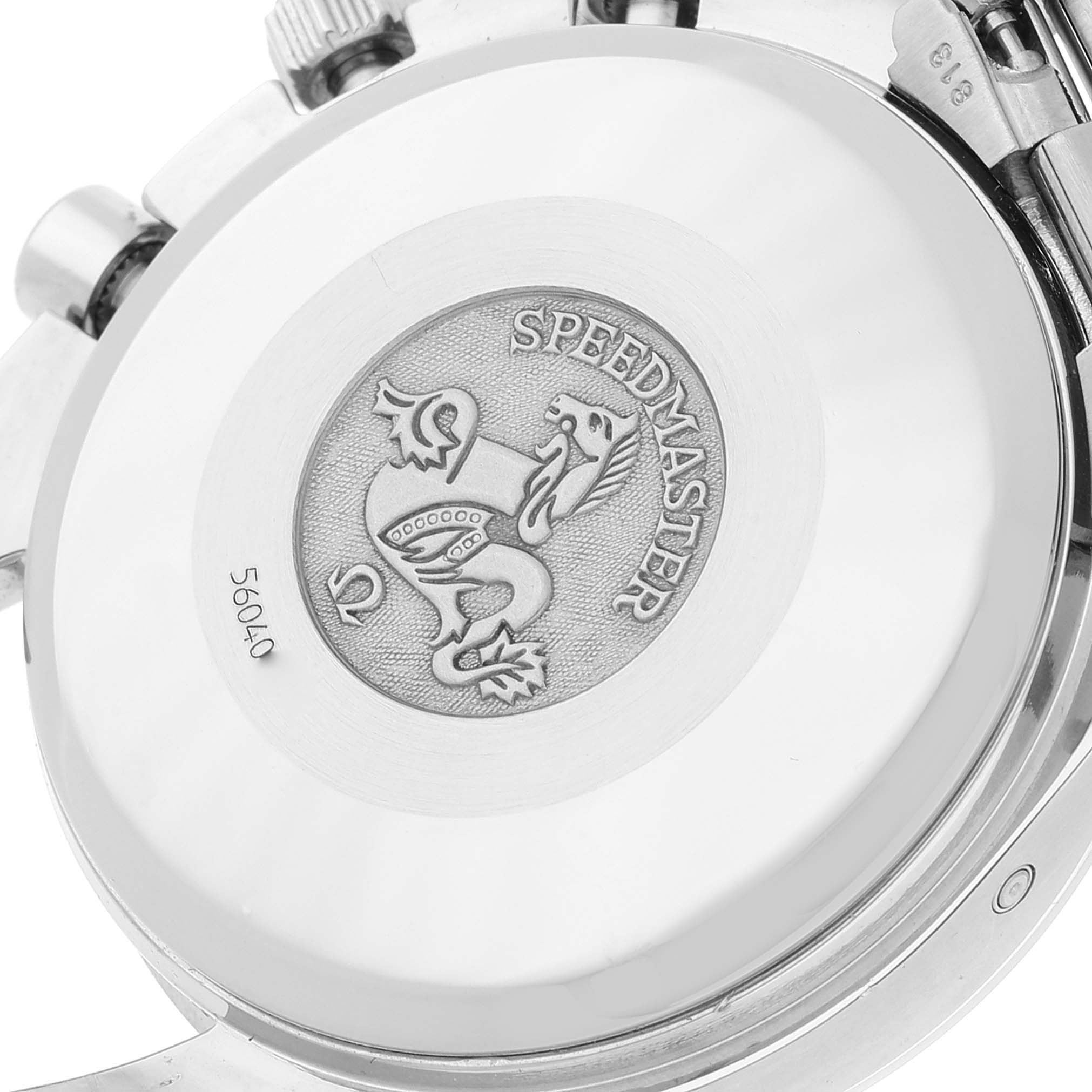 The image shows the case back of an Omega Speedmaster 3521.80.00 Men's Stainless Steel Blue Dial 3521.80.00 Men's Stainless Steel Blue Dial watch, featuring its emblem and text.