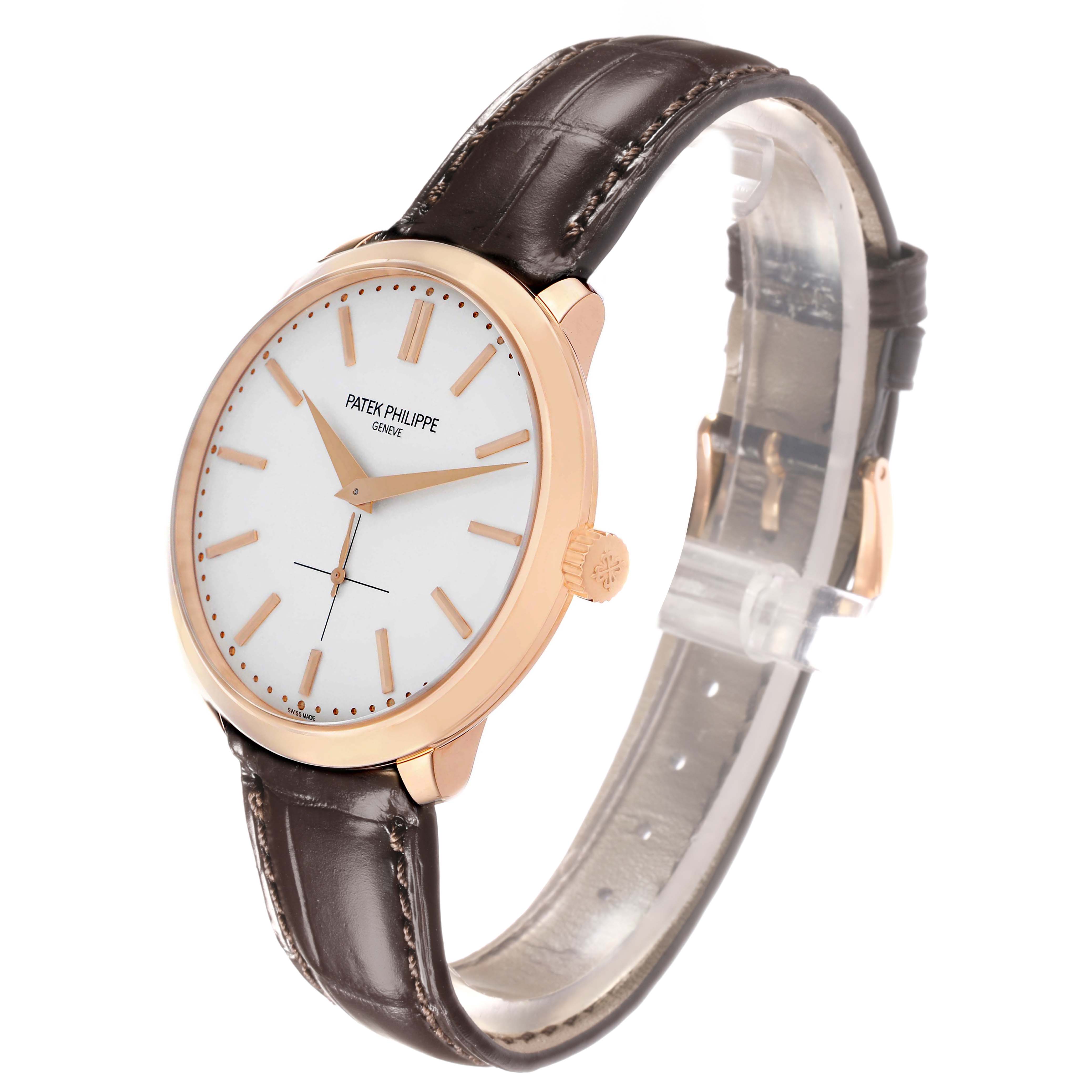 The Patek Philippe Calatrava 5123 Men
s Rose Gold Silver Dial watch is shown at an angled side view, displaying the face, bezel, crown, and leather strap.