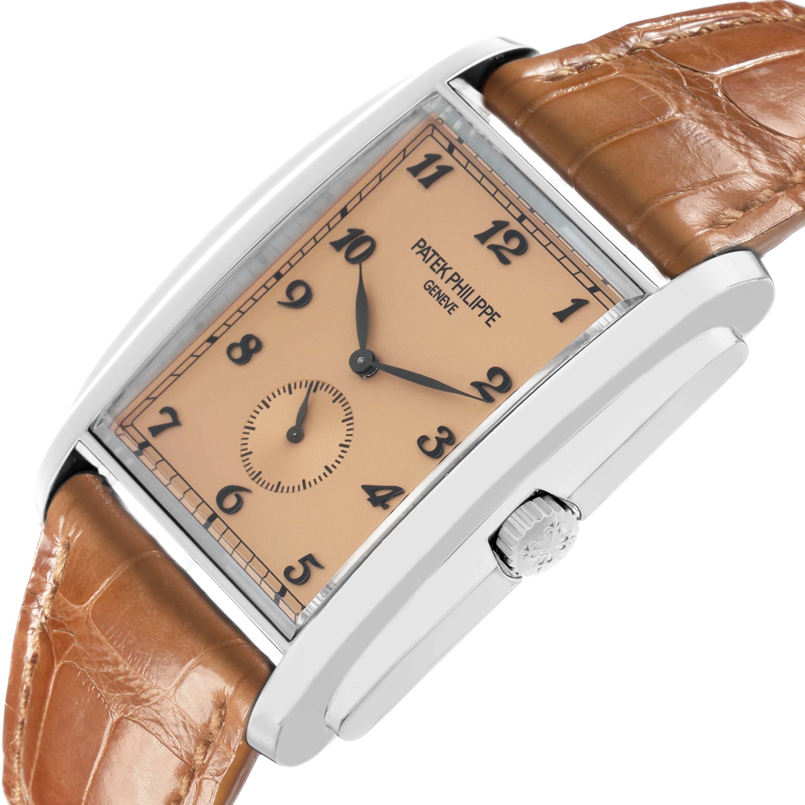 The Patek Philippe Gondolo 5124G Men
s White Gold Brown Dial watch is shown at a tilted angle, highlighting the dial, crown, and brown leather strap.