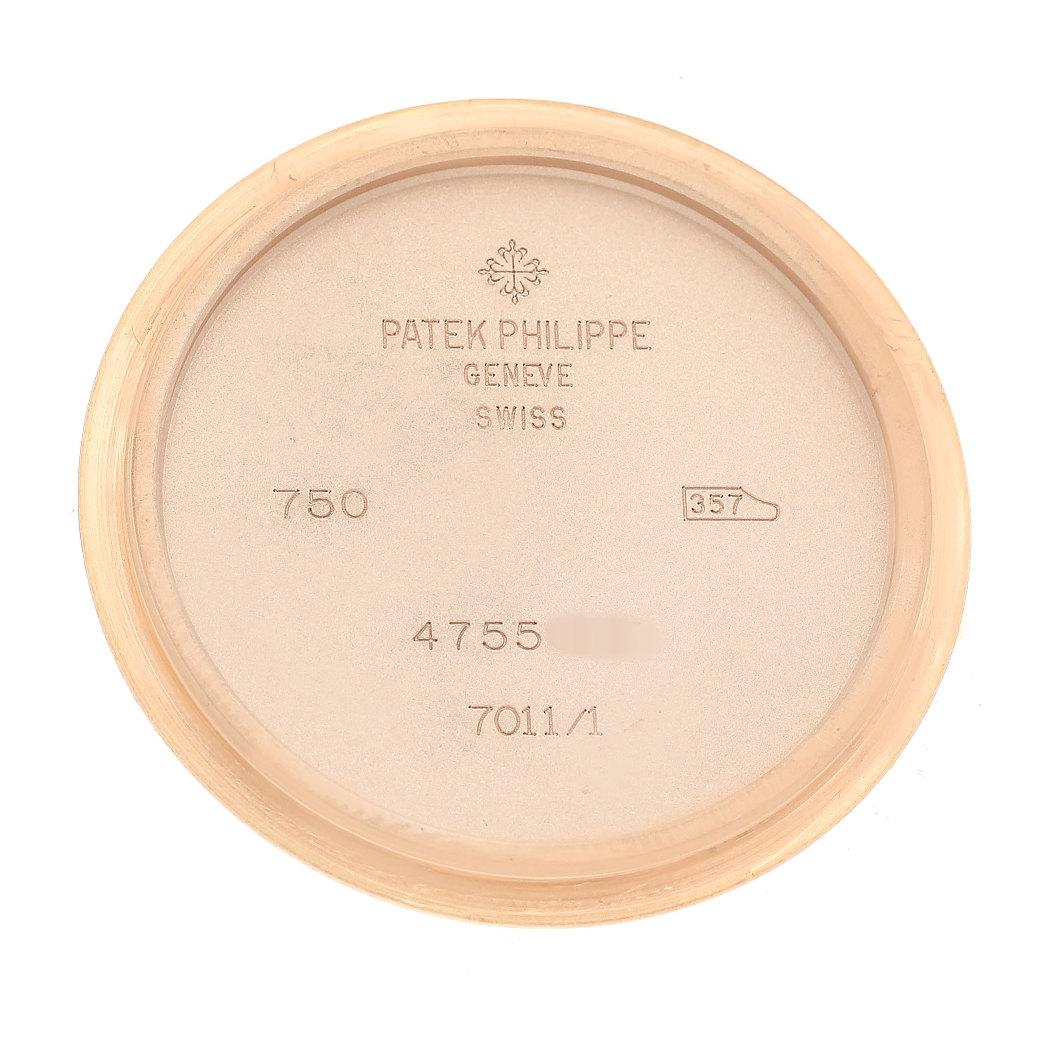 The image shows the inside case back of a Patek Philippe Nautilus 7011/1R-010 Women's Rose Gold Grey Dial watch, displaying engraved markings and brand details.