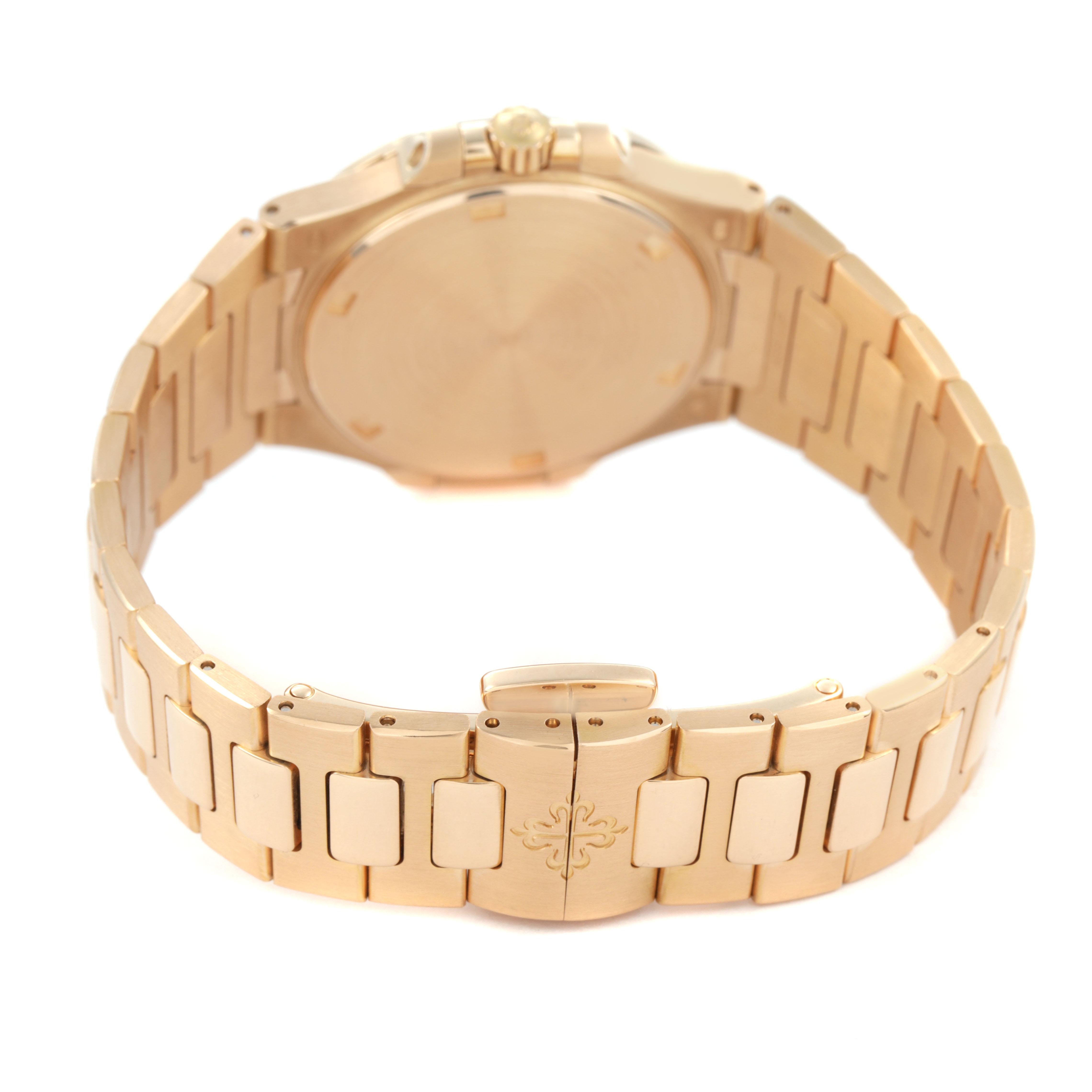 The image shows the back view of the Patek Philippe Nautilus 7011/1R-010 Women's Rose Gold Grey Dial watch, highlighting the bracelet and clasp.