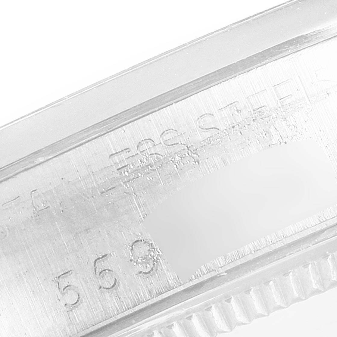 The image shows a close-up angle of the side engraving and bezel of a Rolex Air-King 5500 Men's Stainless Steel Silver Dial 5500 Men's Stainless Steel Silver Dial watch.