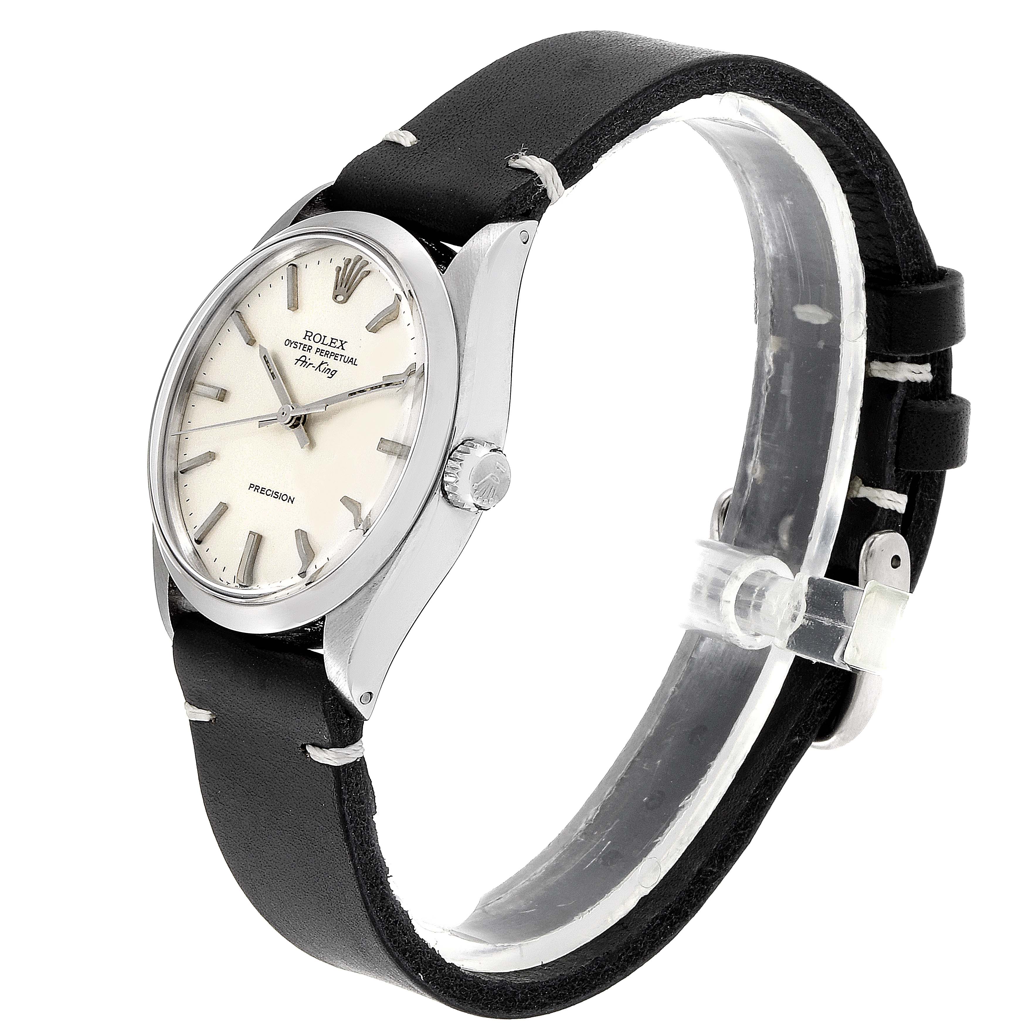 The image shows a side view of a Rolex Air-King 5500 Men's Stainless Steel Silver Dial 5500 Men's Stainless Steel Silver Dial watch, displaying its case, dial, crown, and black leather strap.