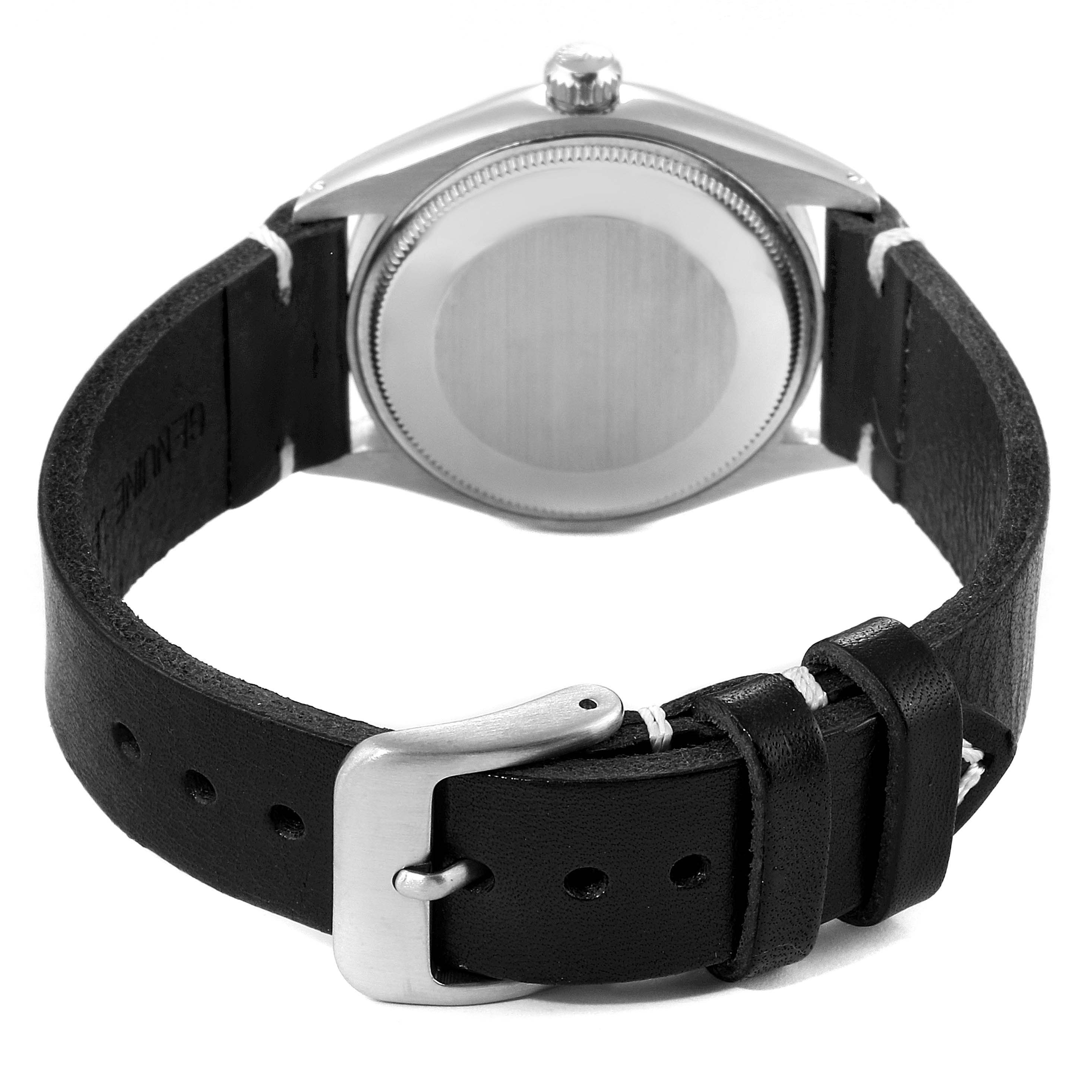 The image shows the back of a Rolex Air-King 5500 Men's Stainless Steel Silver Dial 5500 Men's Stainless Steel Silver Dial watch, featuring the case back, crown, and leather strap with buckle.