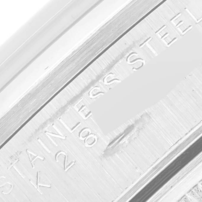 This close-up image shows the engravings on the stainless steel caseback of a Rolex Air-King 14000 Men's Stainless Steel Silver Dial 14000 Men's Stainless Steel Silver Dial watch.