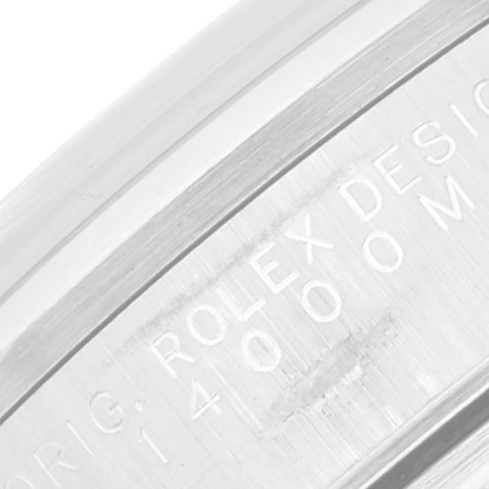 This image shows a close-up of the engraving on the side of a Rolex Air-King 14000 Men's Stainless Steel Silver Dial 14000 Men's Stainless Steel Silver Dial watch case.