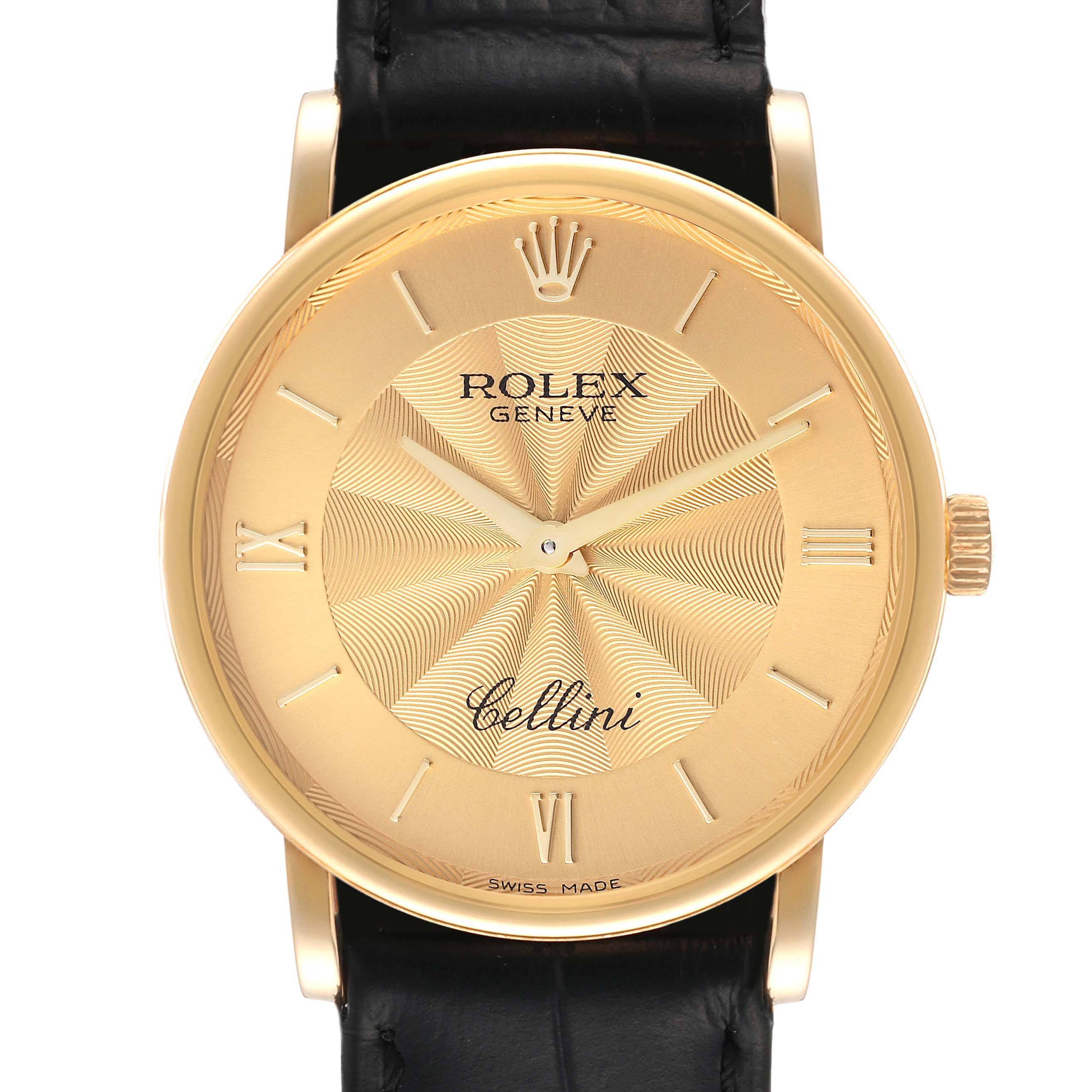 This image shows a front view of a Rolex Cellini 5115 Men
s Yellow Gold Champagne Dial 5115 Men
s Yellow Gold Champagne Dial watch, highlighting its gold dial, Roman numerals, and black leather strap.