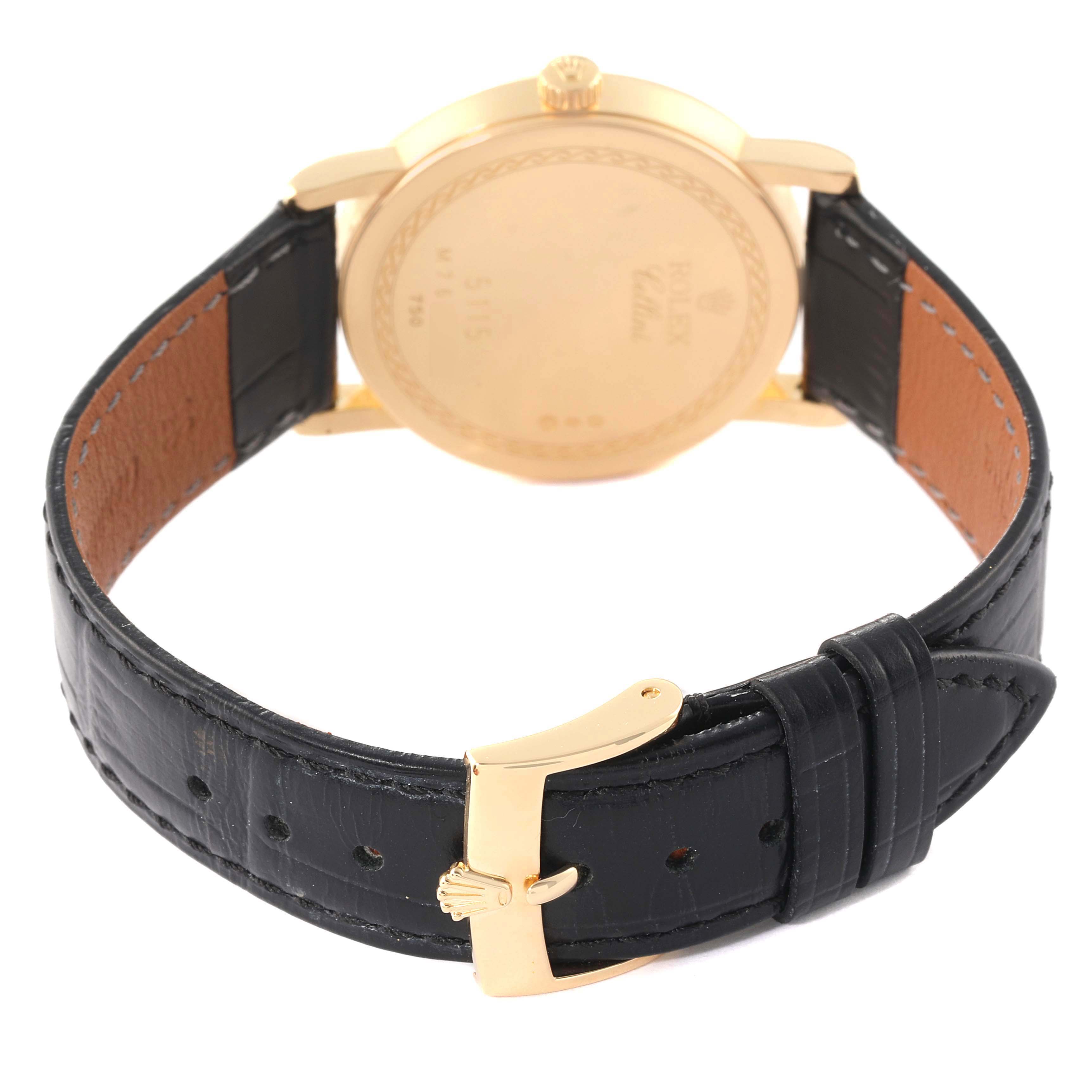 The image shows the back and strap of the Rolex Cellini 5115 Men
s Yellow Gold Champagne Dial 5115 Men
s Yellow Gold Champagne Dial watch from a rear angle.