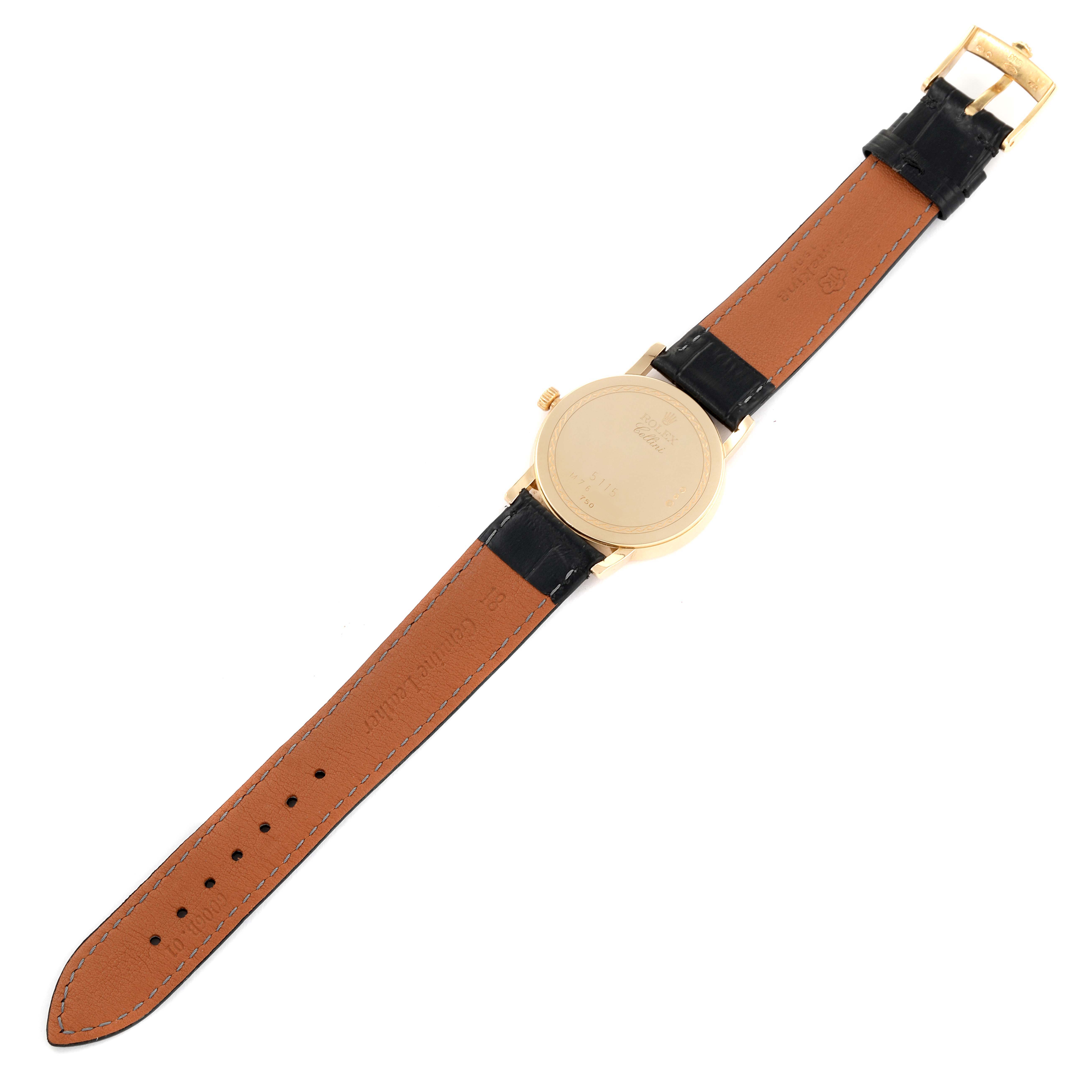 This image shows the back and strap of a Rolex Cellini 5115 Men
s Yellow Gold Champagne Dial 5115 Men
s Yellow Gold Champagne Dial watch, highlighting the leather band and gold clasp.