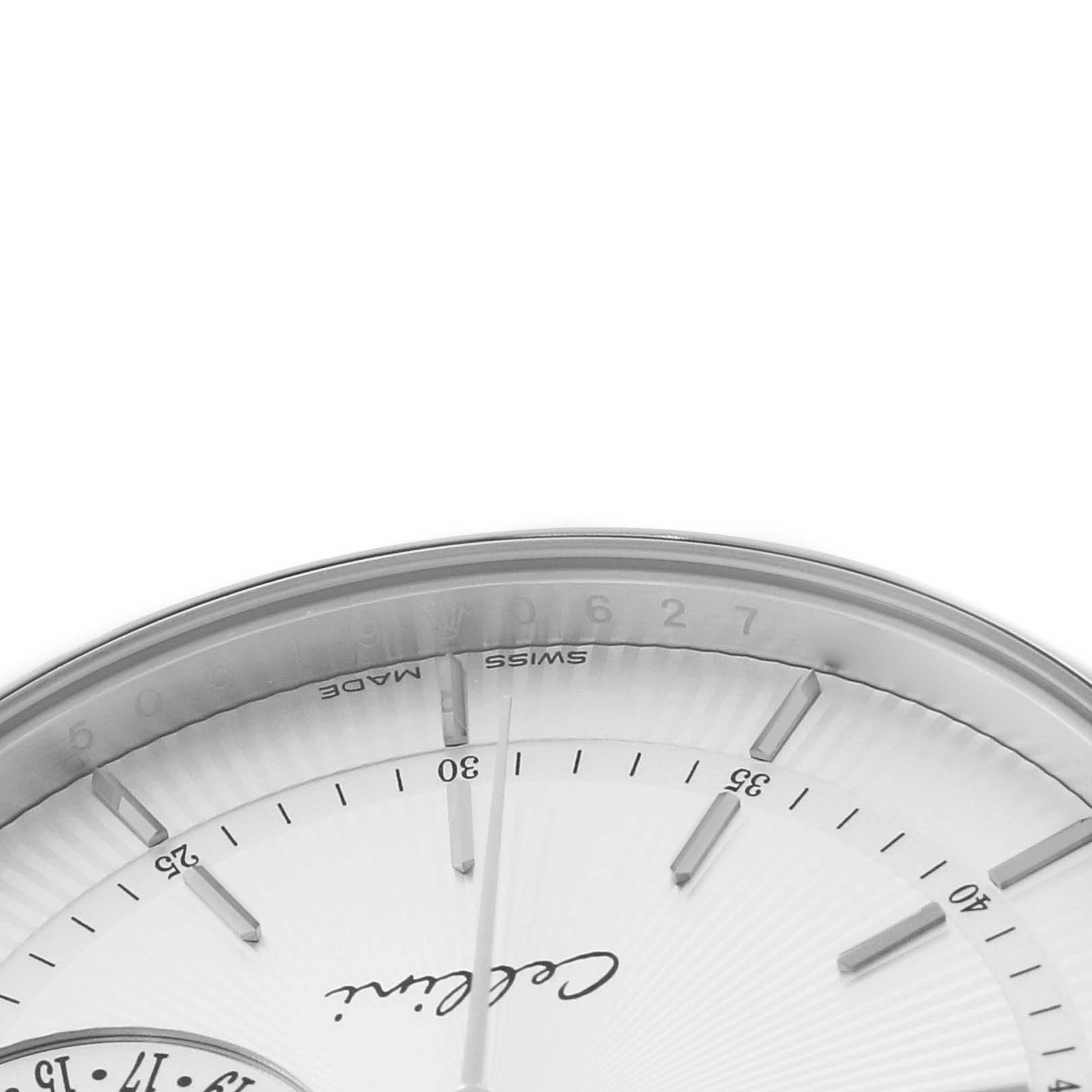 The image shows a close-up of the upper portion of the Rolex Cellini 50519 Men
s White Gold Silver Dial watch dial, featuring hour markers and a segment of the bezel.