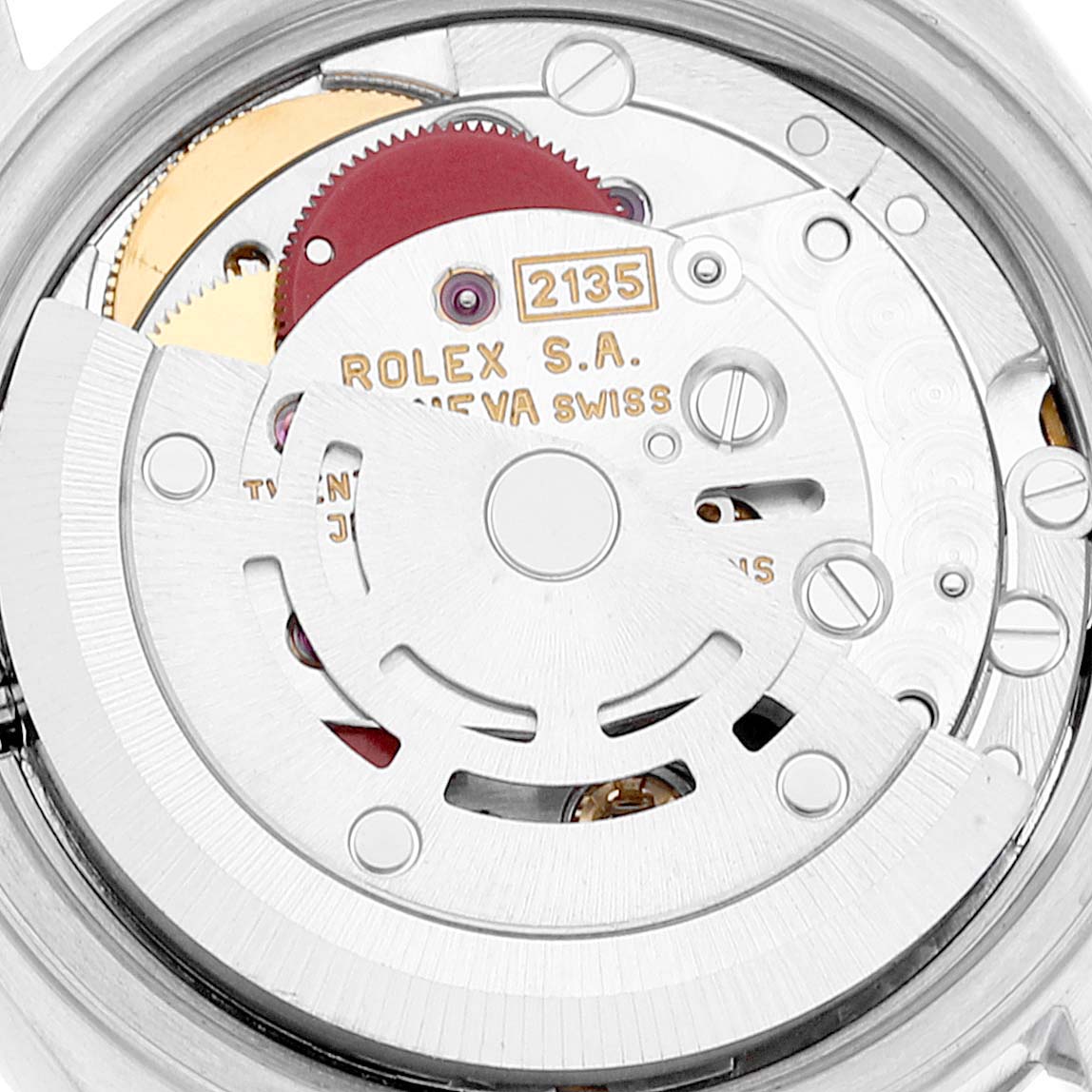 The image shows a close-up of the movement components inside a Rolex Date 69190 Women's Stainless Steel Blue Dial 69190 Women's Stainless Steel Blue Dial model watch.